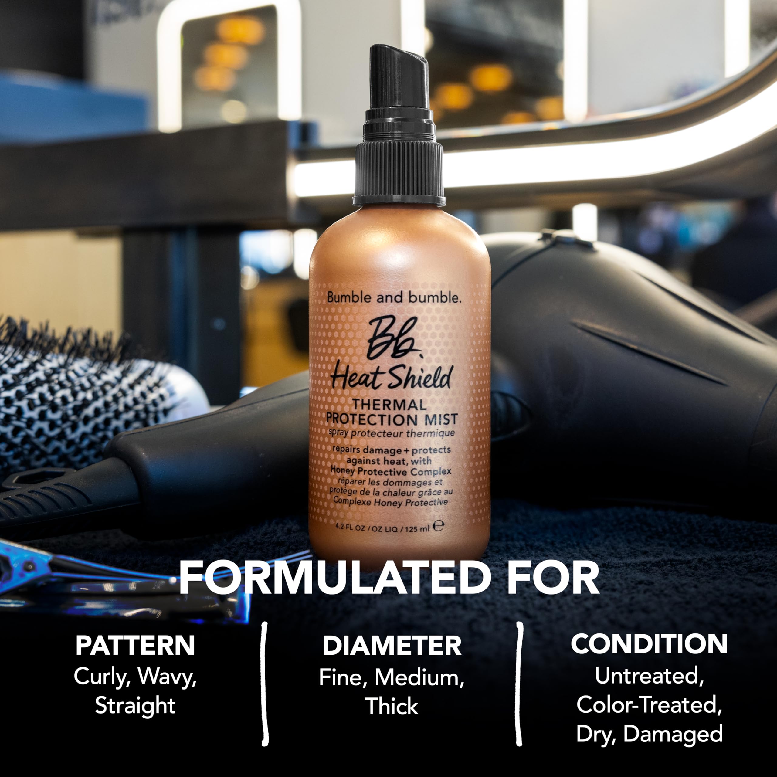 Bumble and bumble Heat Shield Thermal Mist 2 fl oz bottle, hair styling agent for heat protection in a clear spray bottle