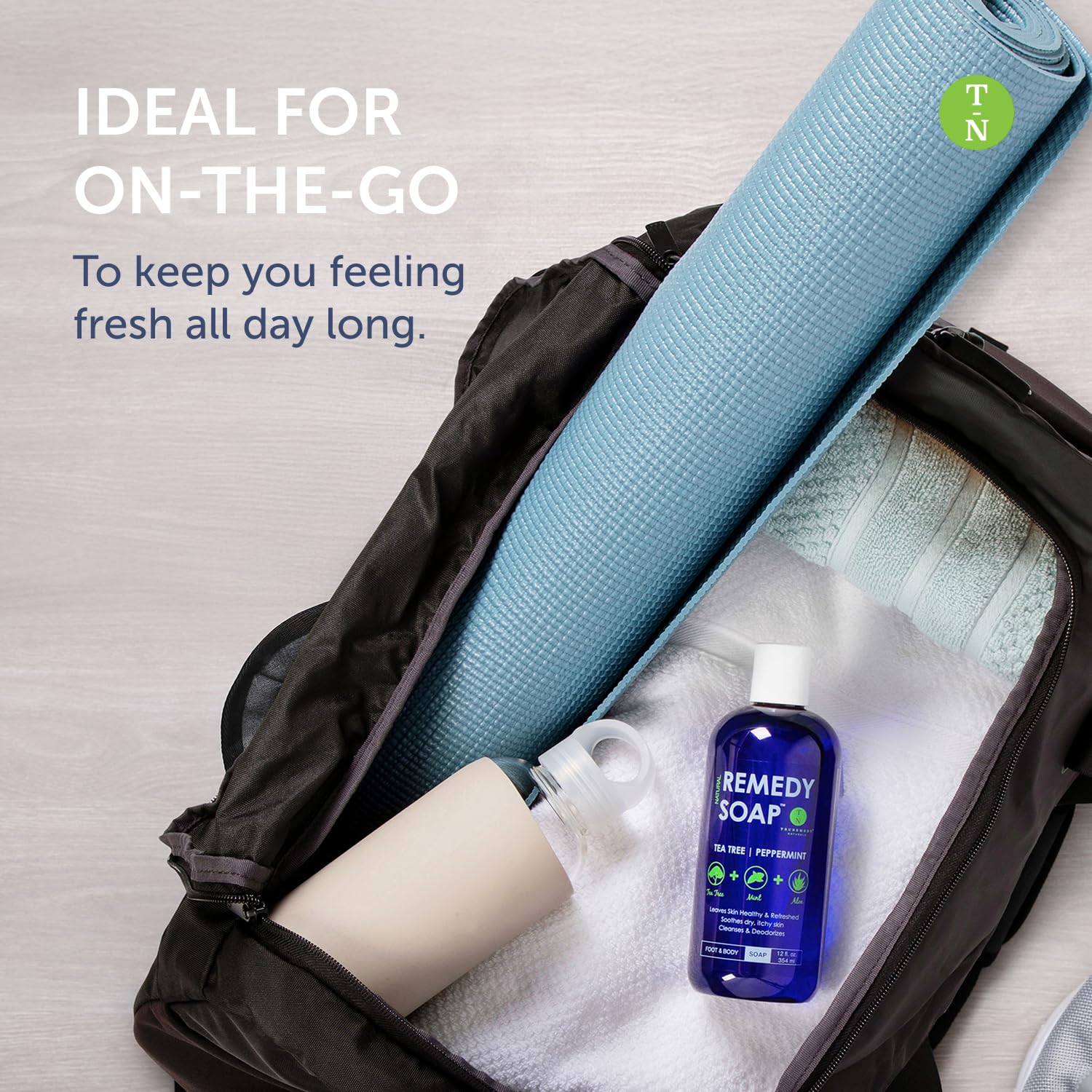 Truremedy Naturals Tea Tree and Peppermint Body Wash in 12oz bottle, showing the product with fresh ingredients and packaging.