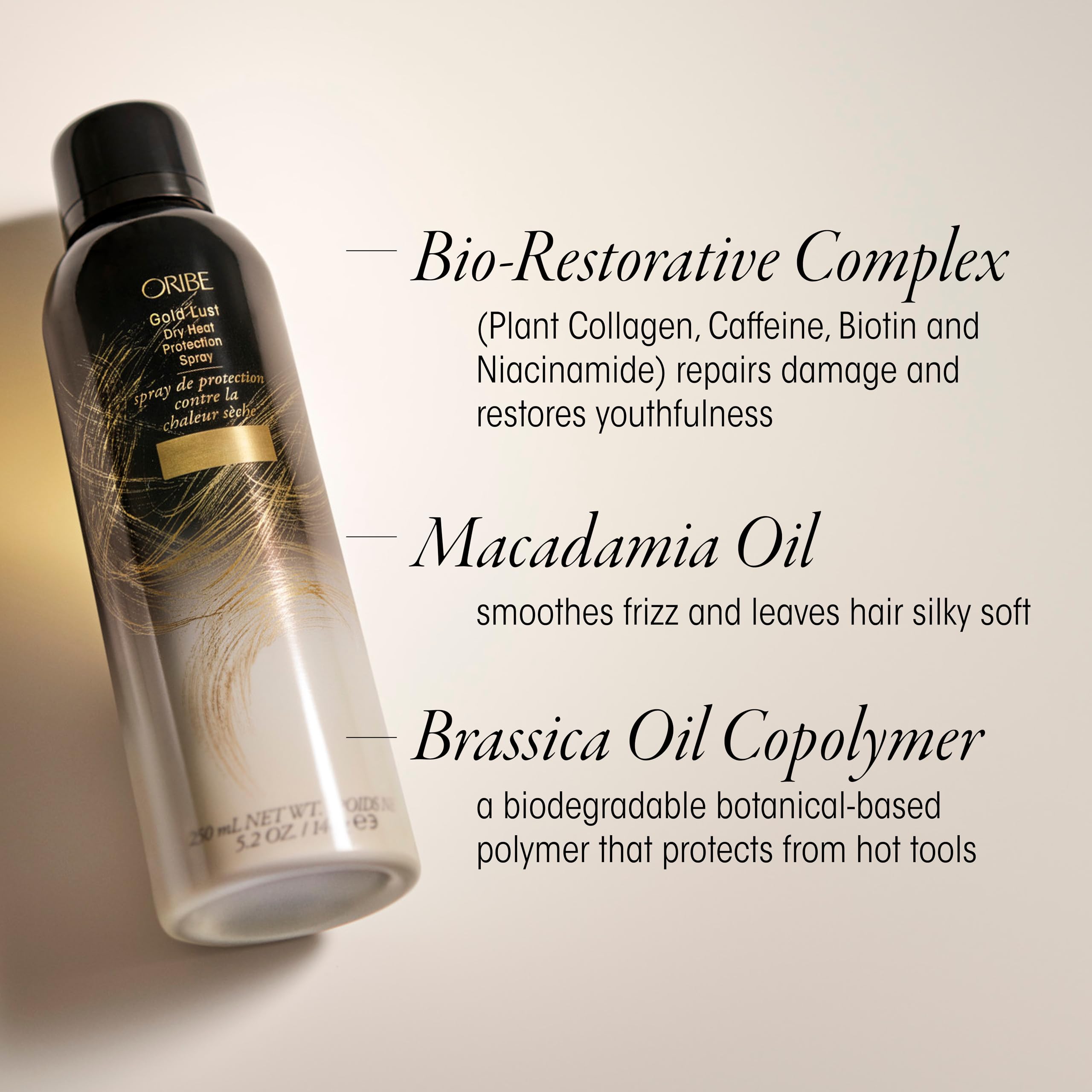 Oribe Gold Lust Heat Protection Spray in 5.2oz bottle, designed to protect hair from heat up to 450°F during styling.