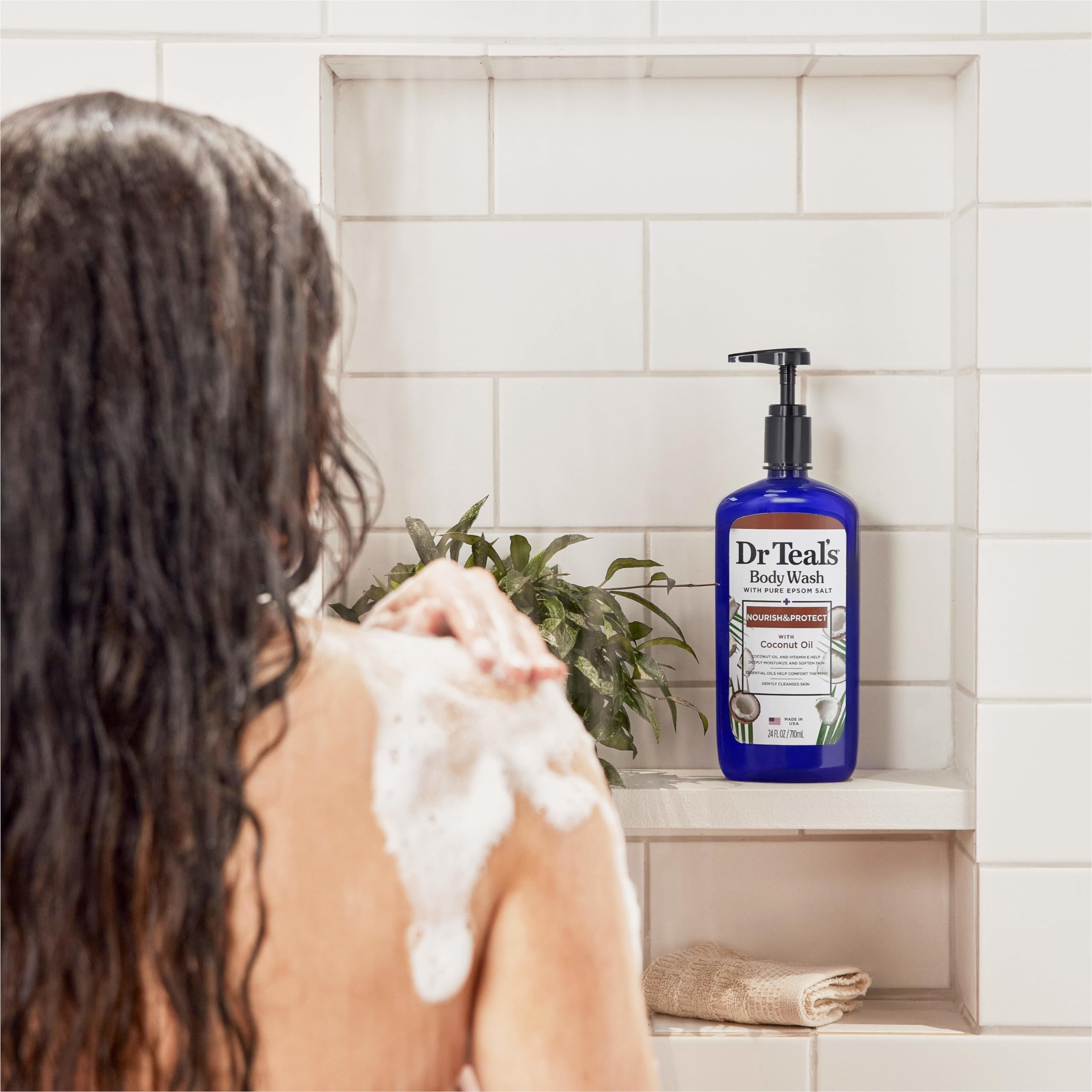 Dr Teal's body wash with Epsom salt and coconut oil, 24 fl oz, in a pack of four, showing the bottle with label and cap.