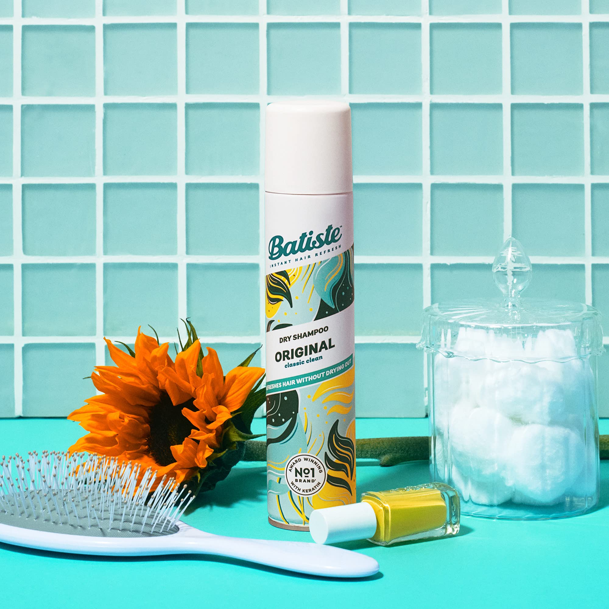 Batiste Original Dry Shampoo bottle with classic clean fragrance, 5.71 oz, showing the product label and packaging.