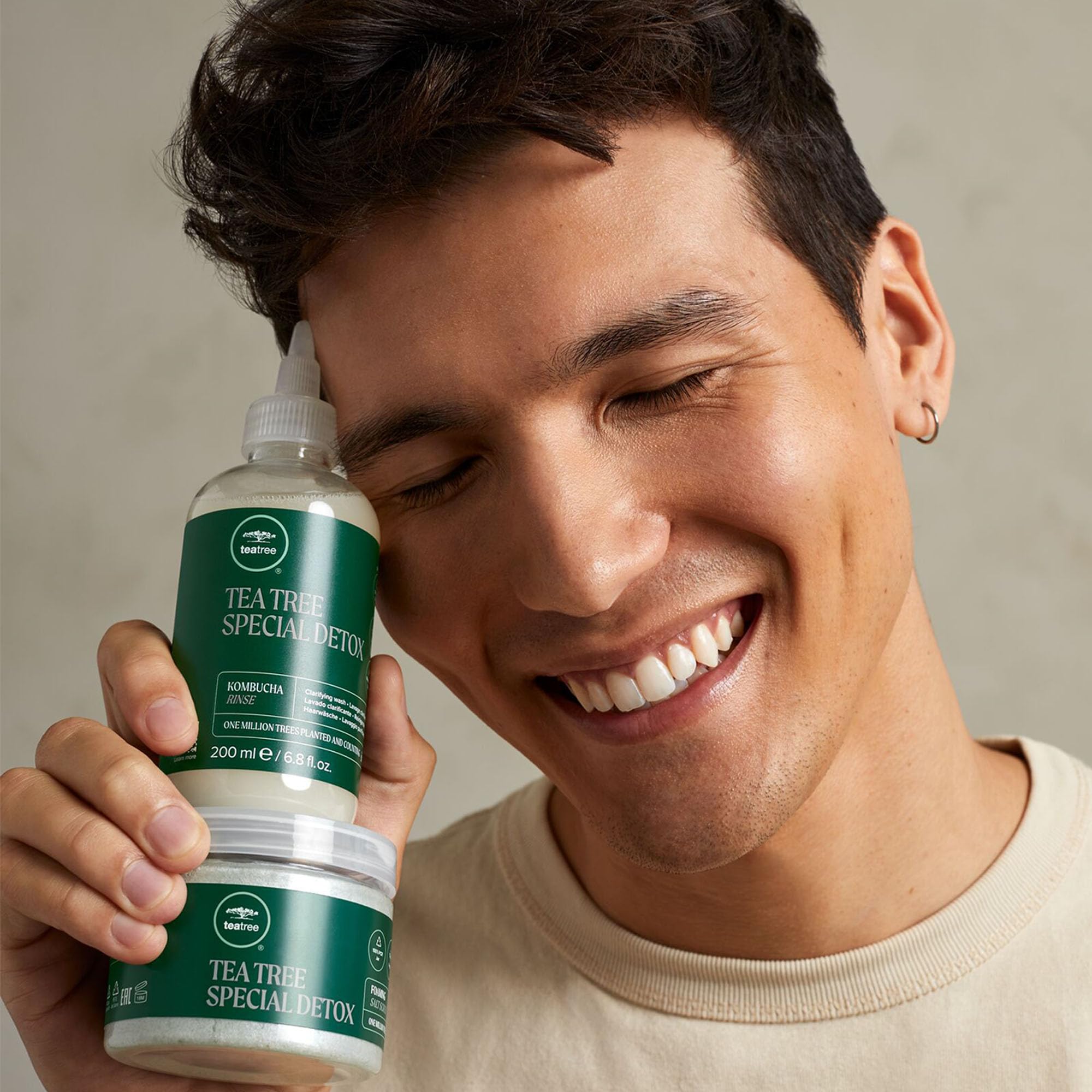 Tea Tree Special Detox Foaming Salt Scrub for hair, exfoliates and refreshes scalp, suitable for all hair types, 6.5 oz bottle.