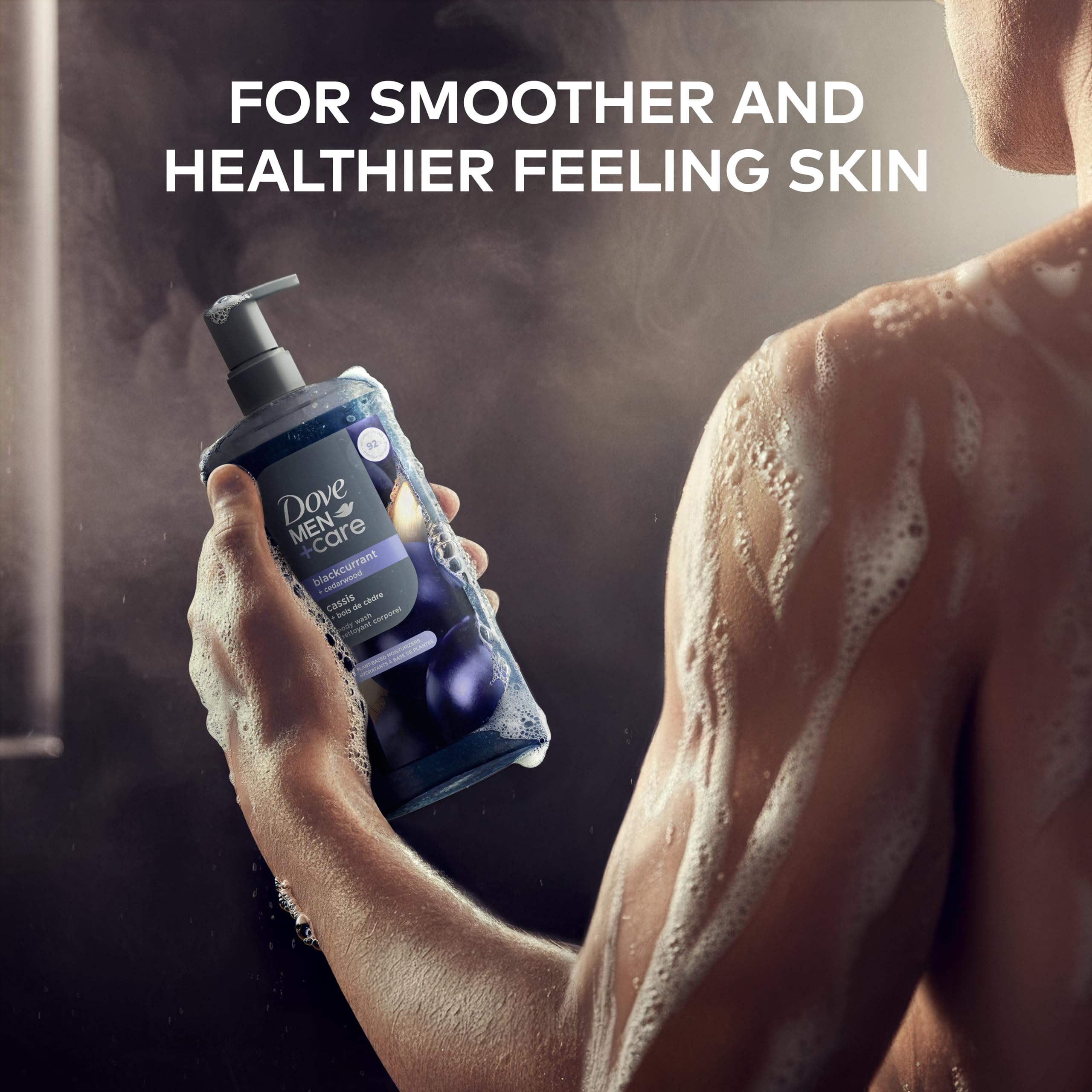 Dove Men+Care Blackcurrant & Cedarwood body wash in 26oz bottle, showing the product with dark liquid and label details