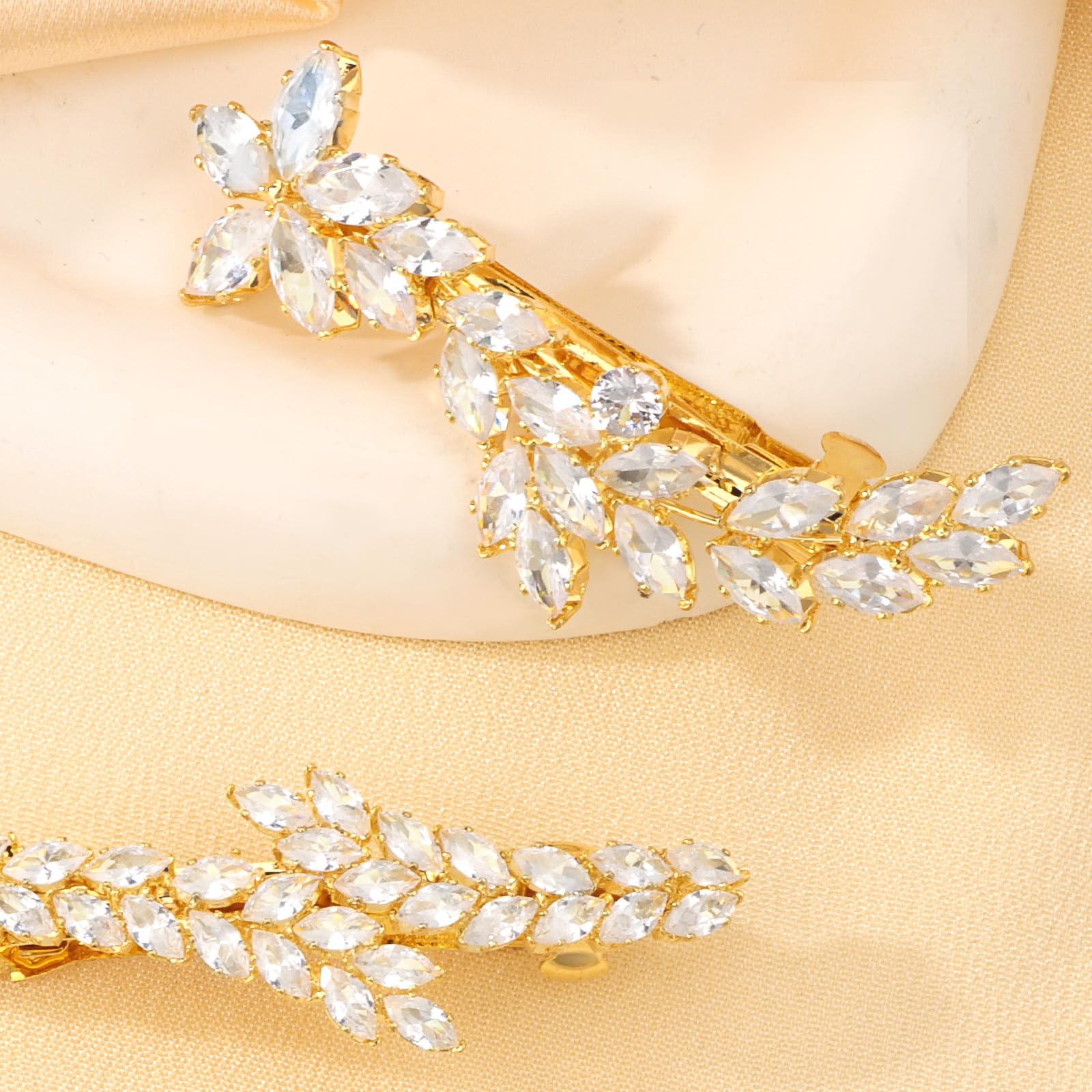 ANBALA gold hair clips for women with rhinestone leaf design, perfect for wedding accessories and elegant hairstyles.