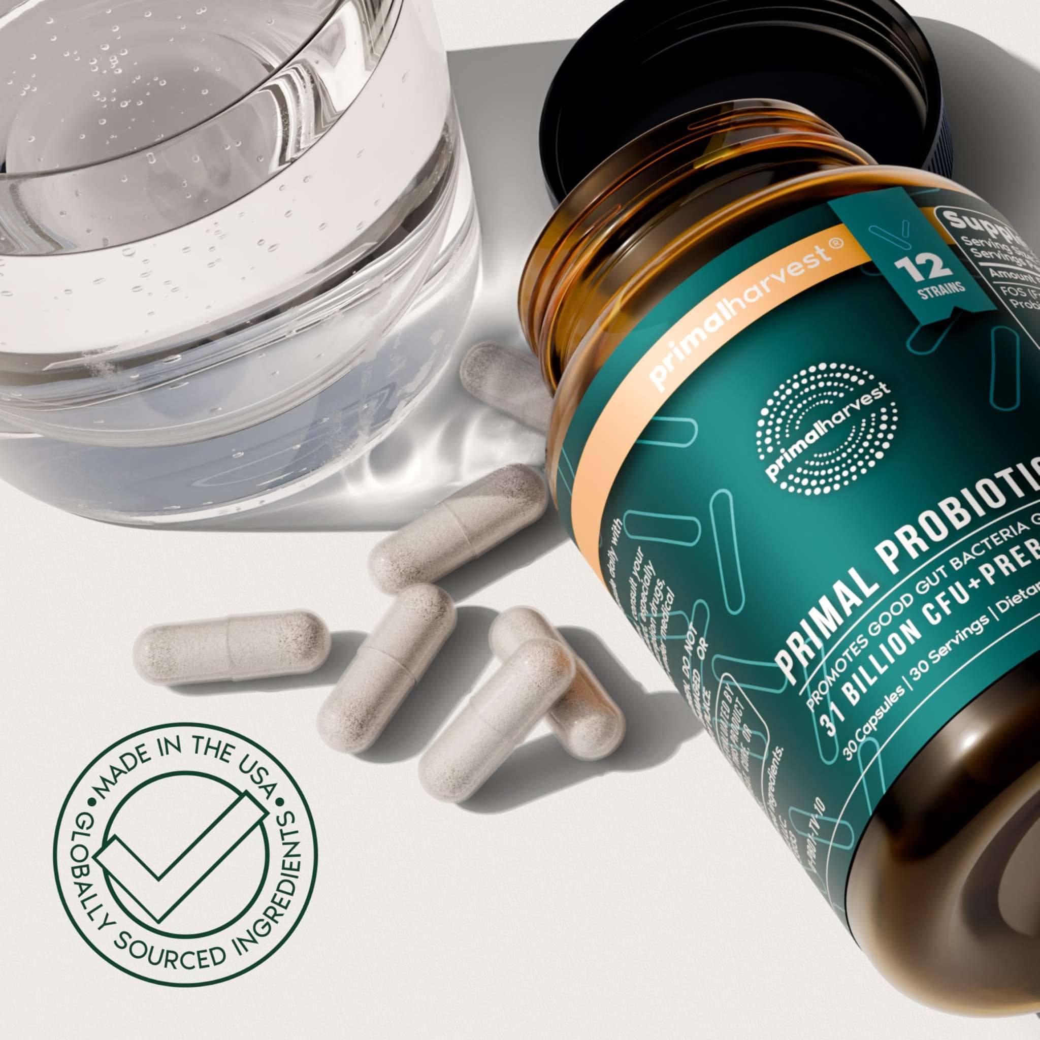 Primal Harvest probiotic supplement with 12 strains for daily gut health, featuring capsules in a white bottle.