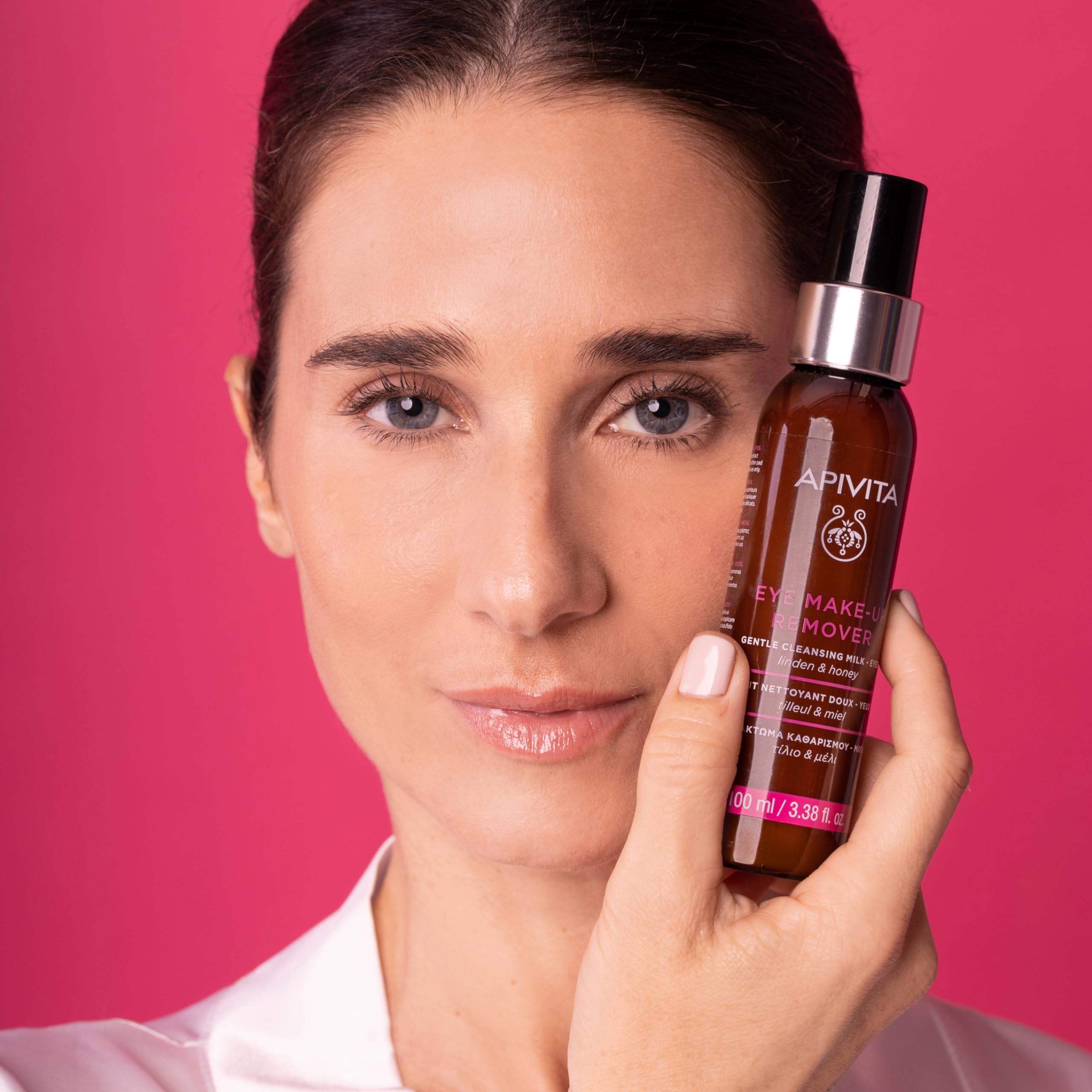 Apivita Eye Makeup Remover bottle showing hydrating and soothing gentle cleansing milk with linden and honey for sensitive eyes.