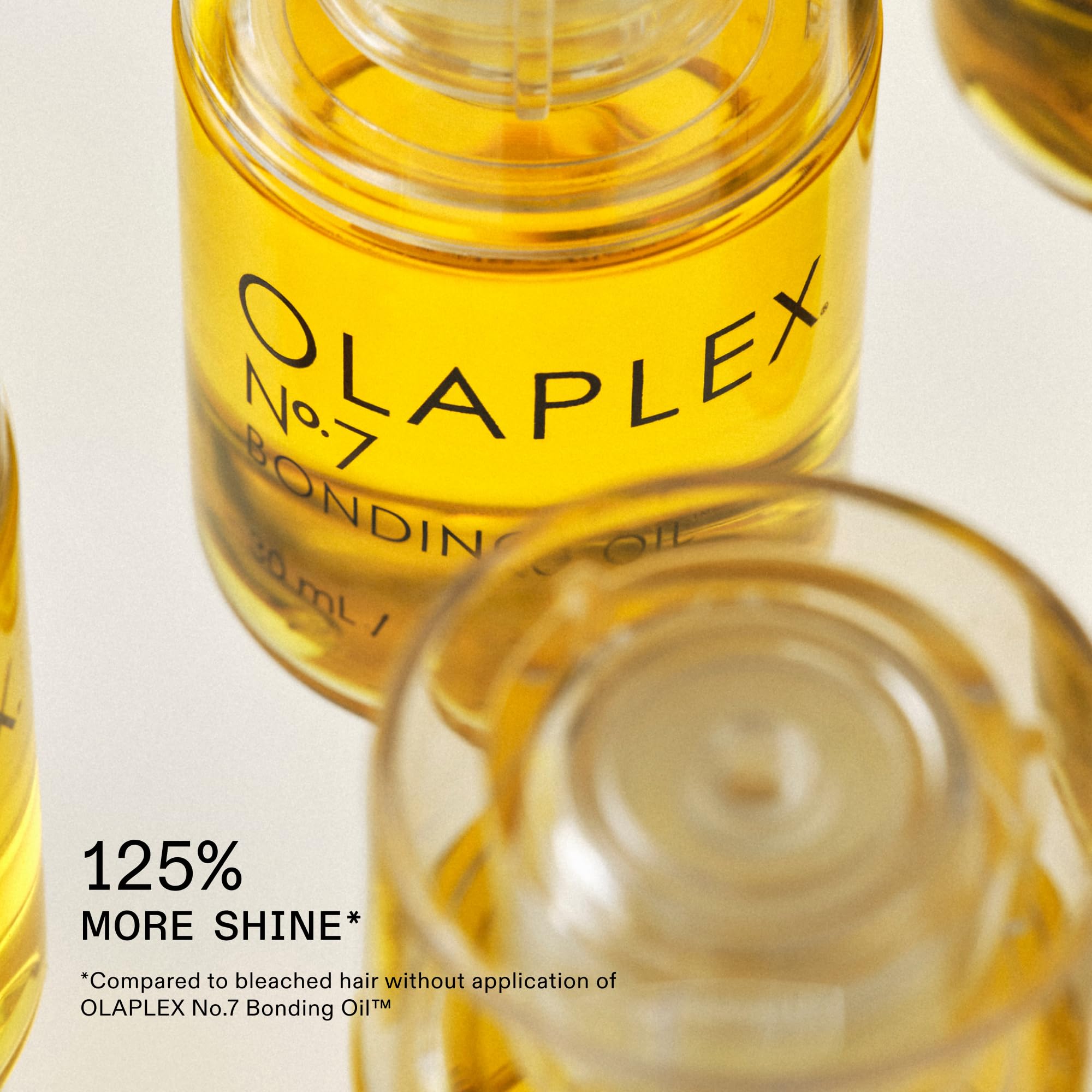 Olaplex No.7 Bonding Hair Oil in 30 mL bottle, high shine styling agent, smooths and enhances hair with a glossy finish.