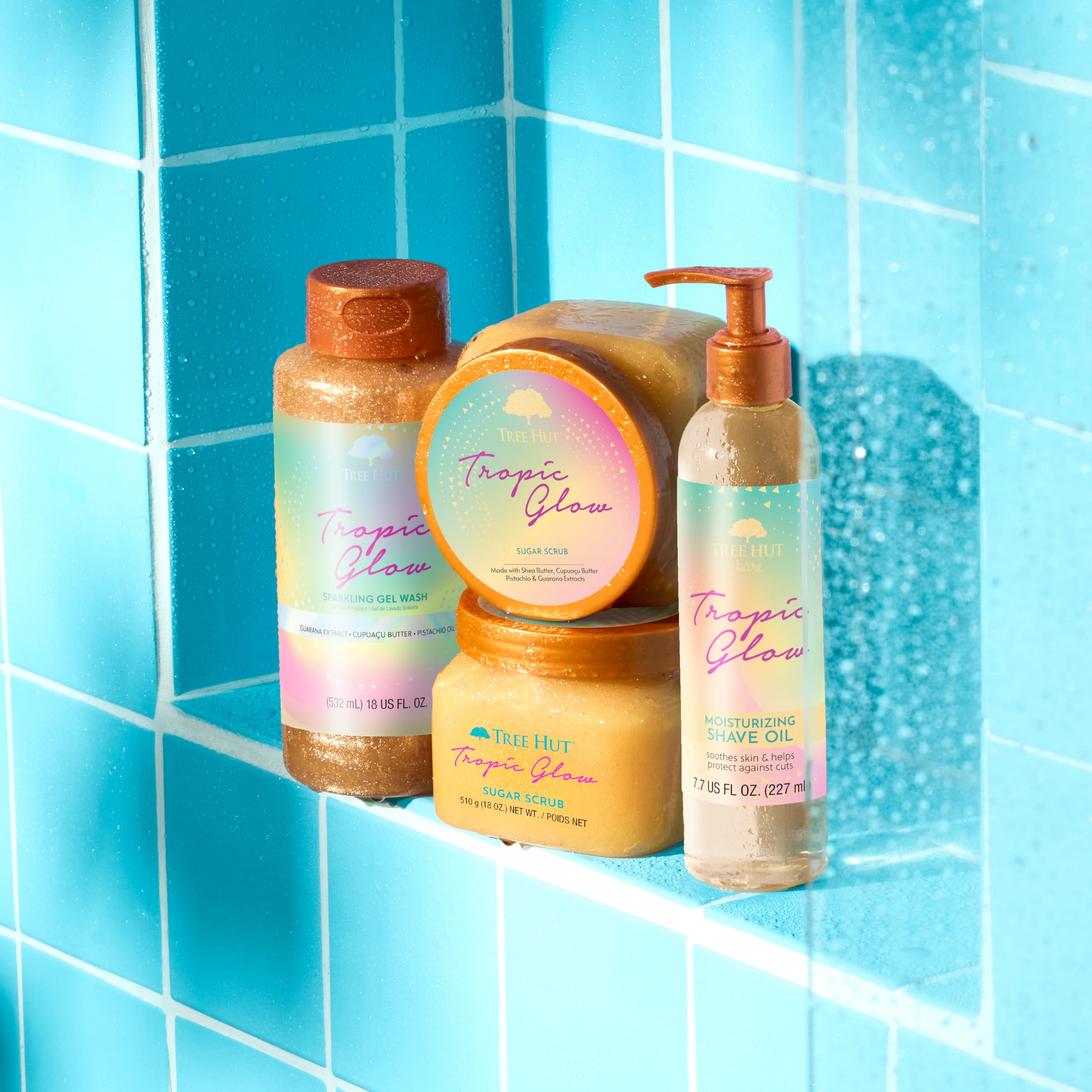 Tree Hut Tropic Glow foaming body wash in a large 18 fl oz bottle with tropical scent and vibrant packaging.