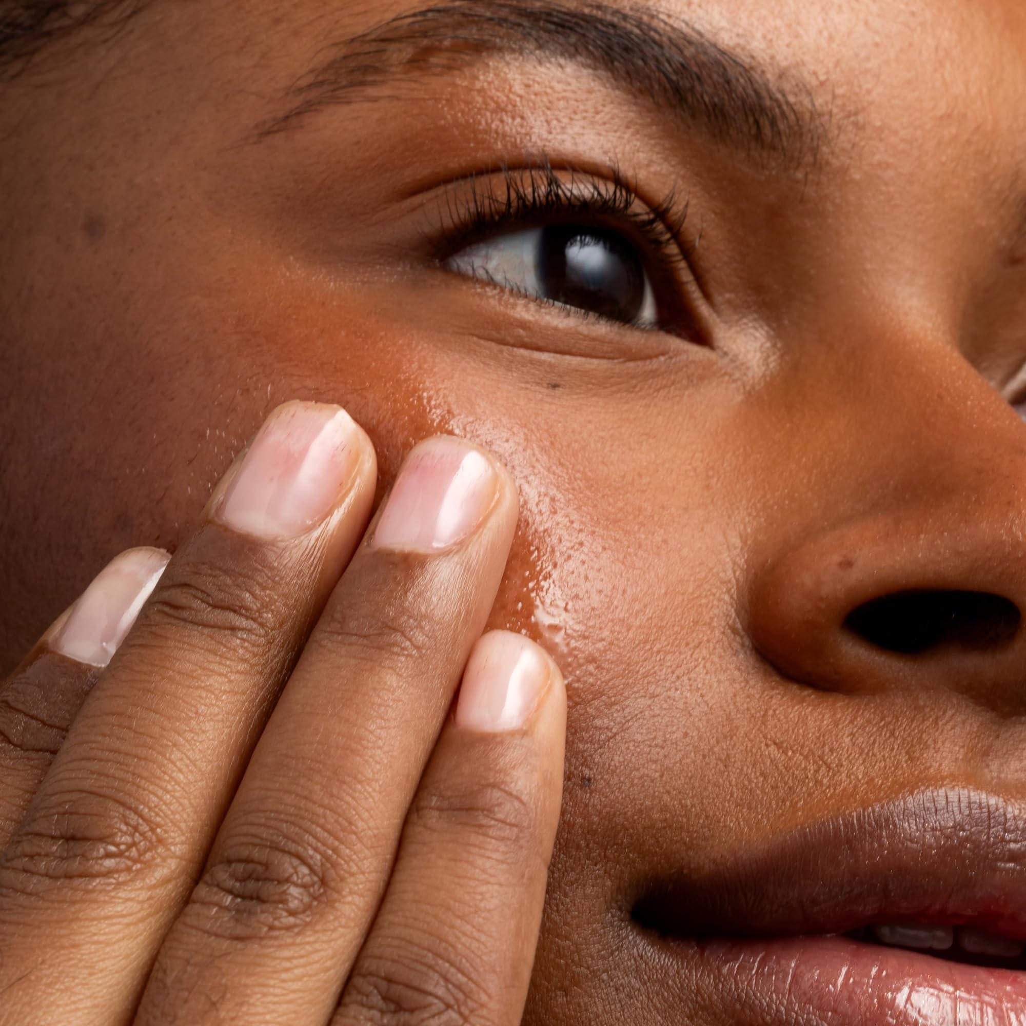Cliganic Organic Jojoba Oil 100% pure 4oz for face, a natural skin moisturizer with a clear glass bottle and dropper cap.