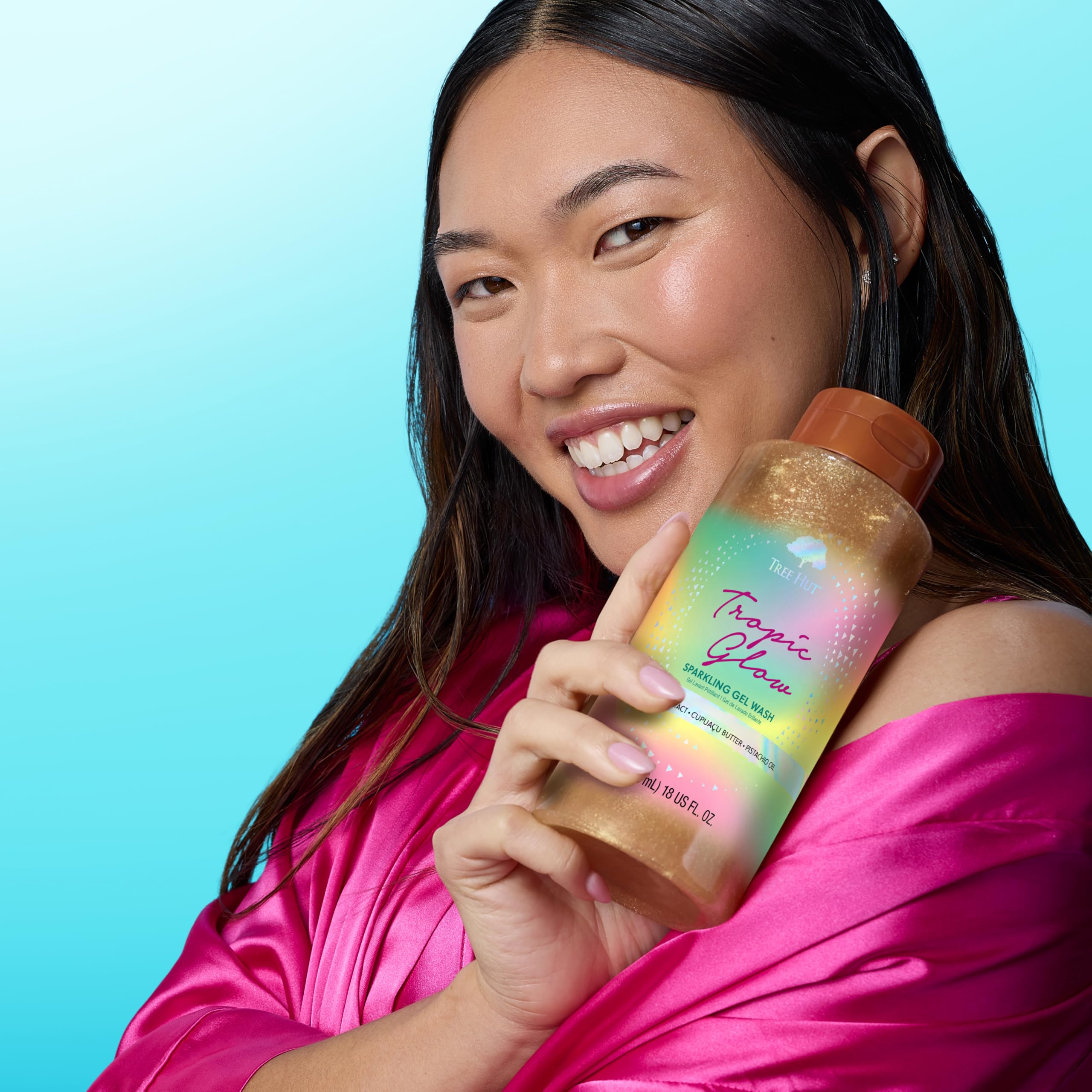 Tree Hut Tropic Glow foaming body wash in 18 oz bottle, tropical scent and rich lather for nourishing skin.