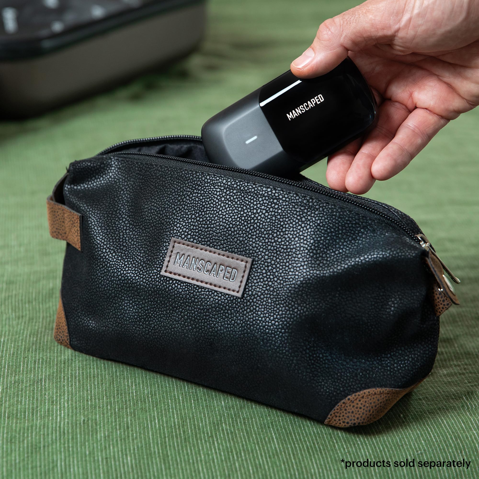 MANSCAPED® The Shed men's toiletry bag in PU leather, a stylish men's cosmetic case for grooming essentials.