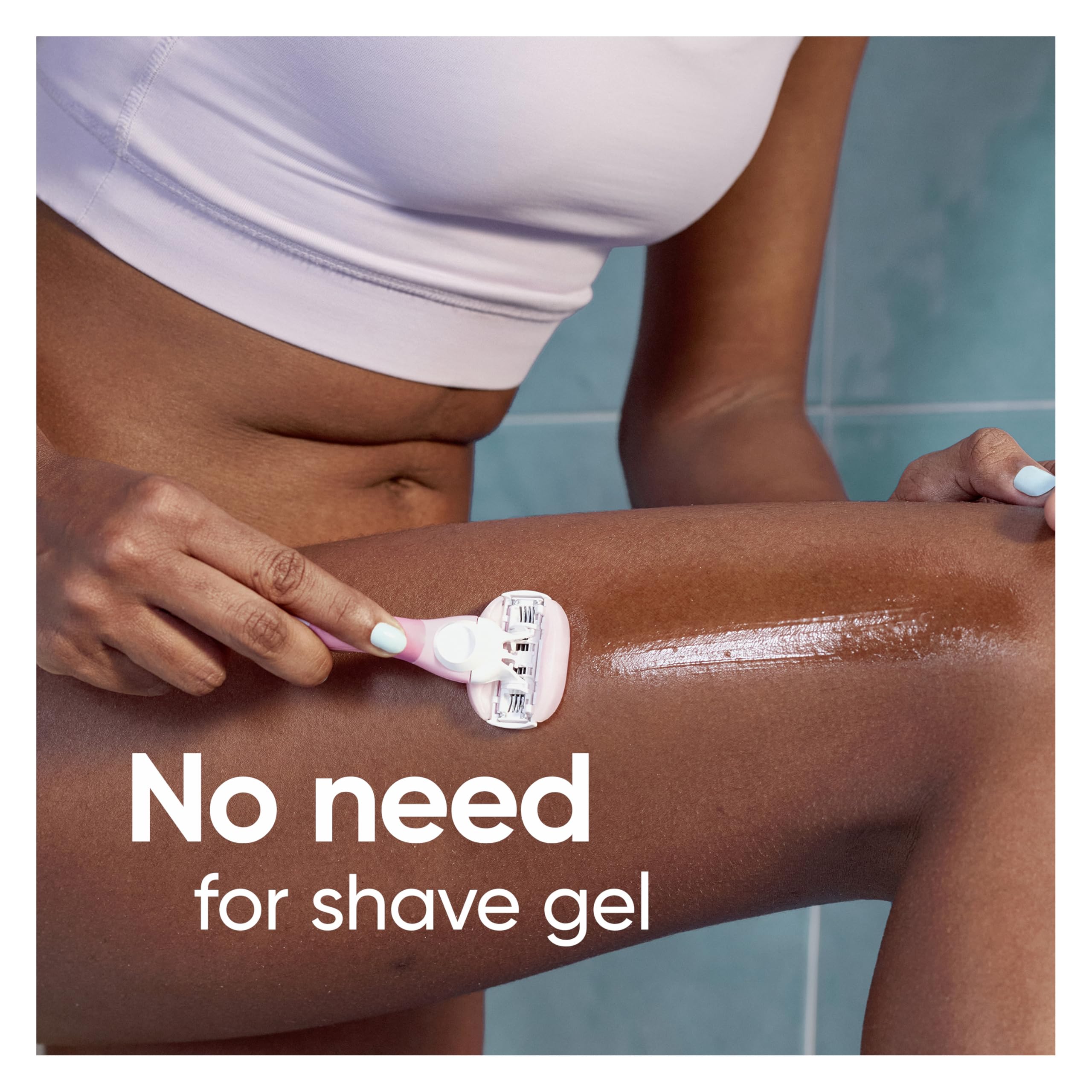 Gillette Venus ComfortGlide White Tea women's manual razor with one handle and four blade refills on a plain background.