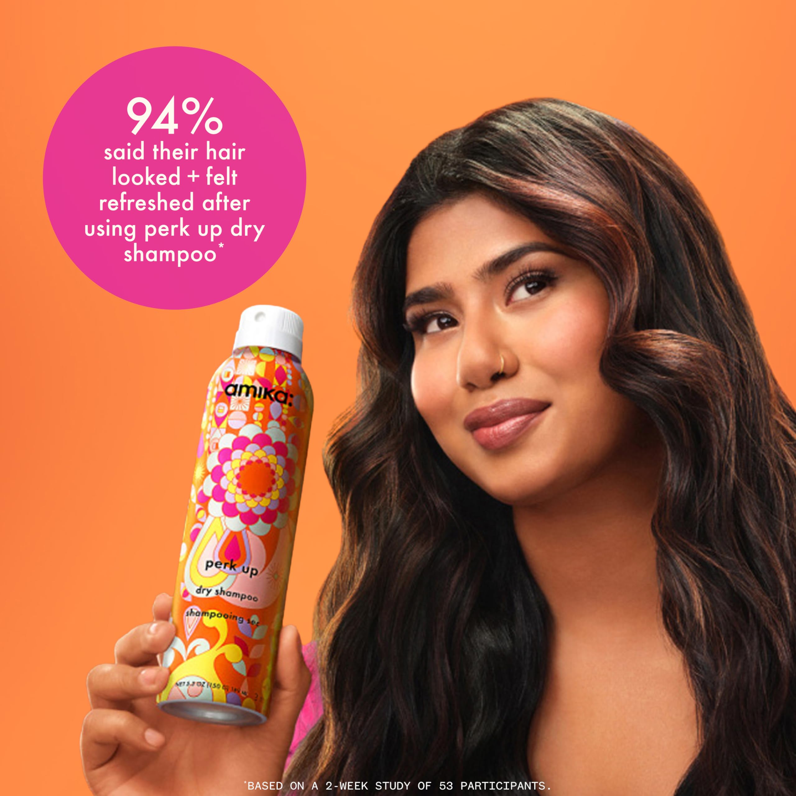 Amika Perk Up Dry Shampoo bottle, 5.3 oz, with spray nozzle and sleek packaging, designed to refresh hair and absorb oil.
