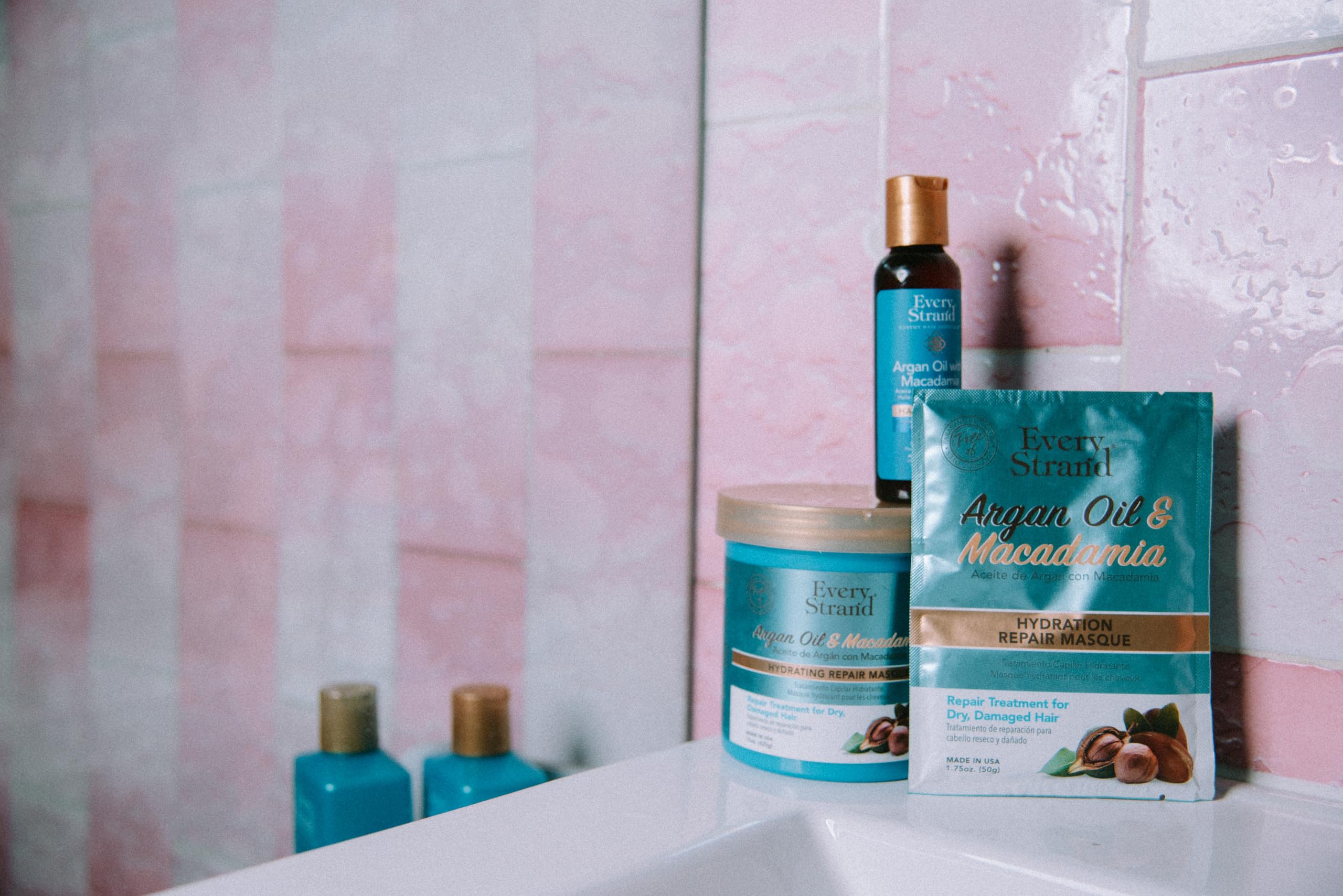Every Strand argan oil and macadamia hydrating hair masque in a 15 oz jar, designed for nourishing and moisturizing hair care.