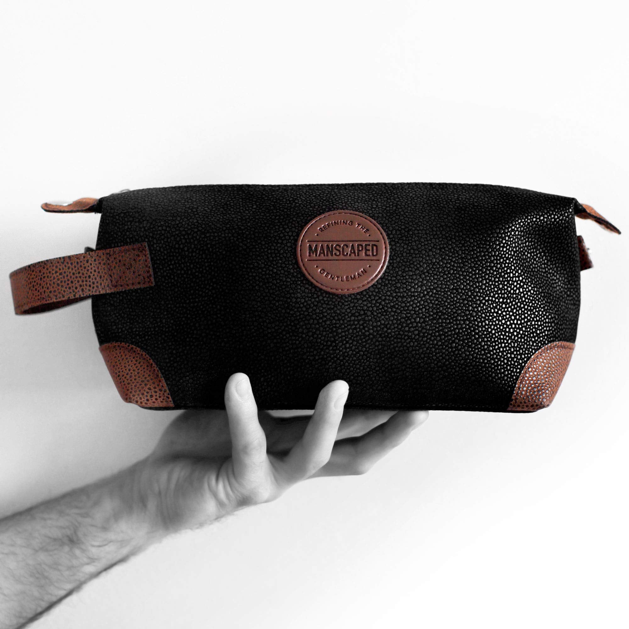 MANSCAPED The Shed men's toiletry bag in PU leather, a stylish Dopp kit for grooming essentials.