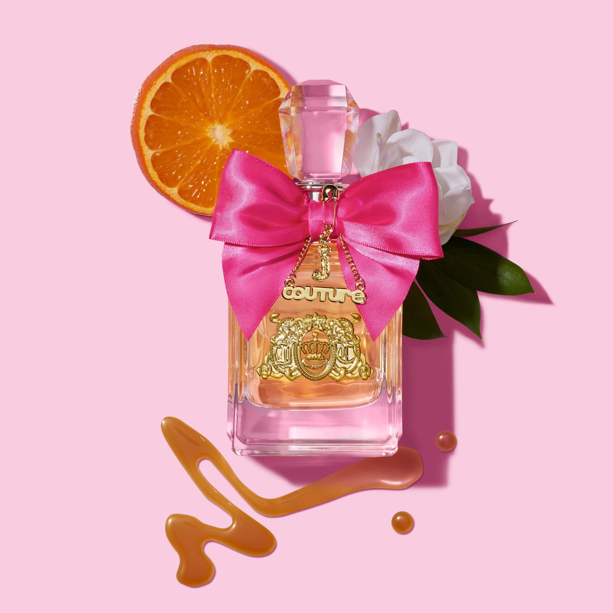 Juicy Couture Viva La Juicy EDP perfume spray for women, featuring a stylish bottle with pink and gold accents.