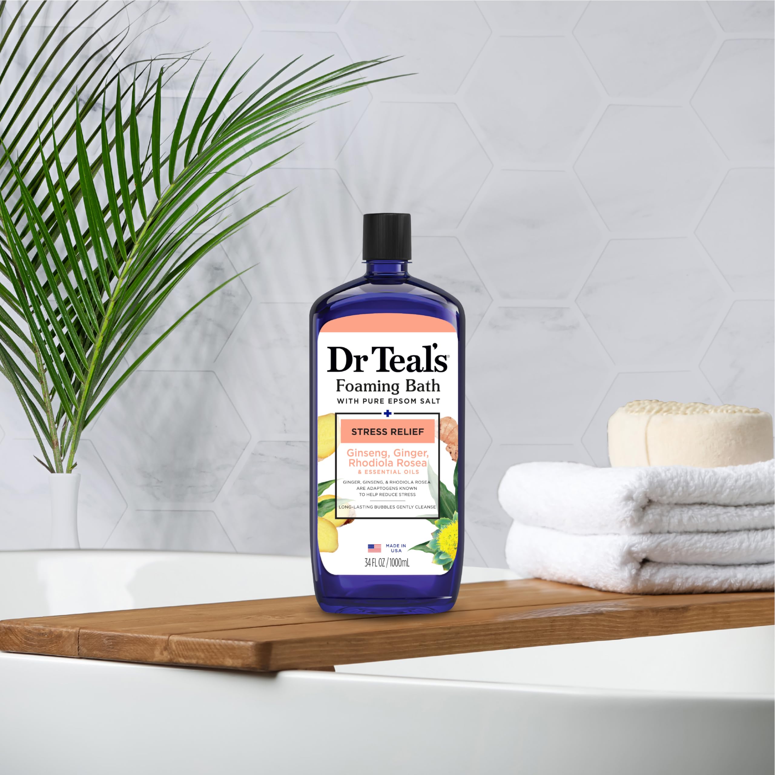 Dr Teal's foaming bath with Epsom salt, ginseng, and ginger in a 34 fl oz bottle, showing the bath additive for stress relief.