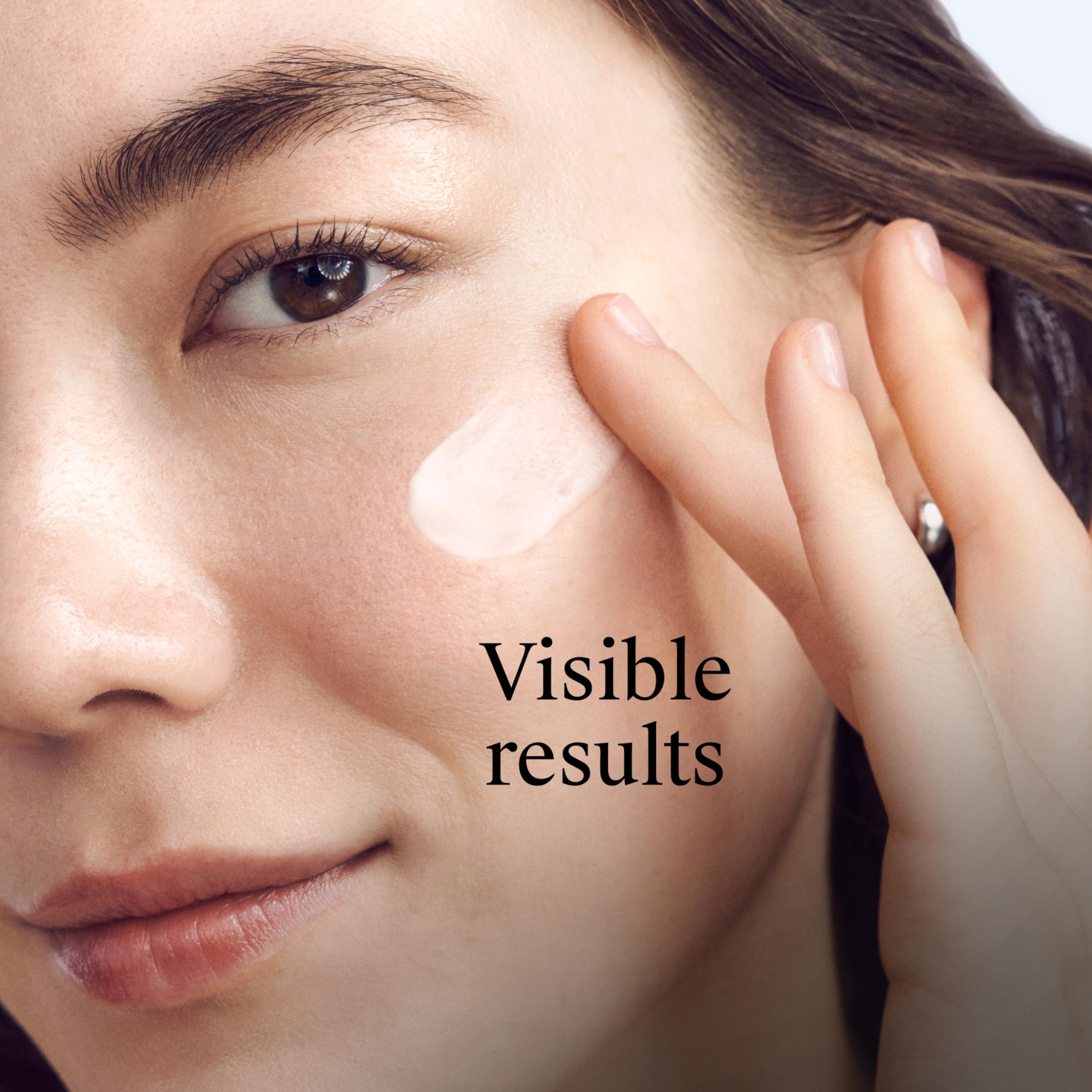 Neutrogena Triple Age Repair Night Face Moisturizer in 1.7 oz jar, showing the cream texture and packaging.
