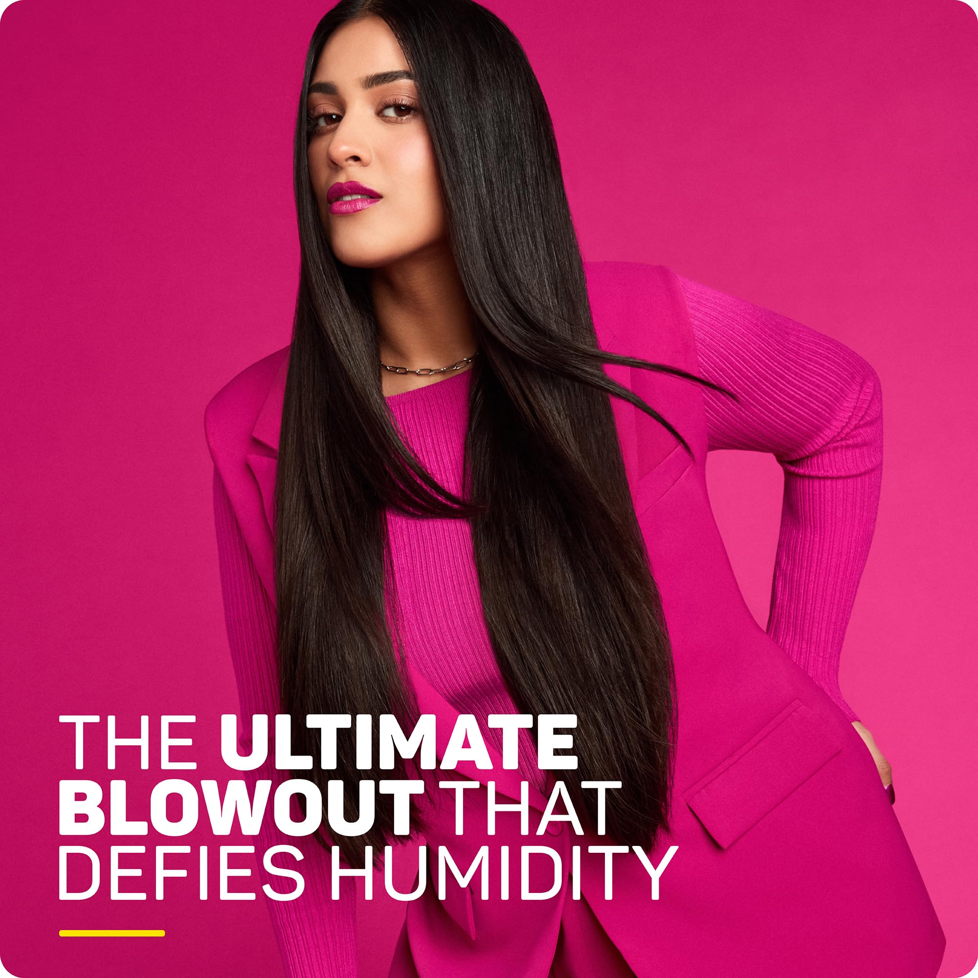 Marc Anthony Grow Long Blowout anti-frizz heat spray for hair styling, with a spray bottle and hair in the background.
