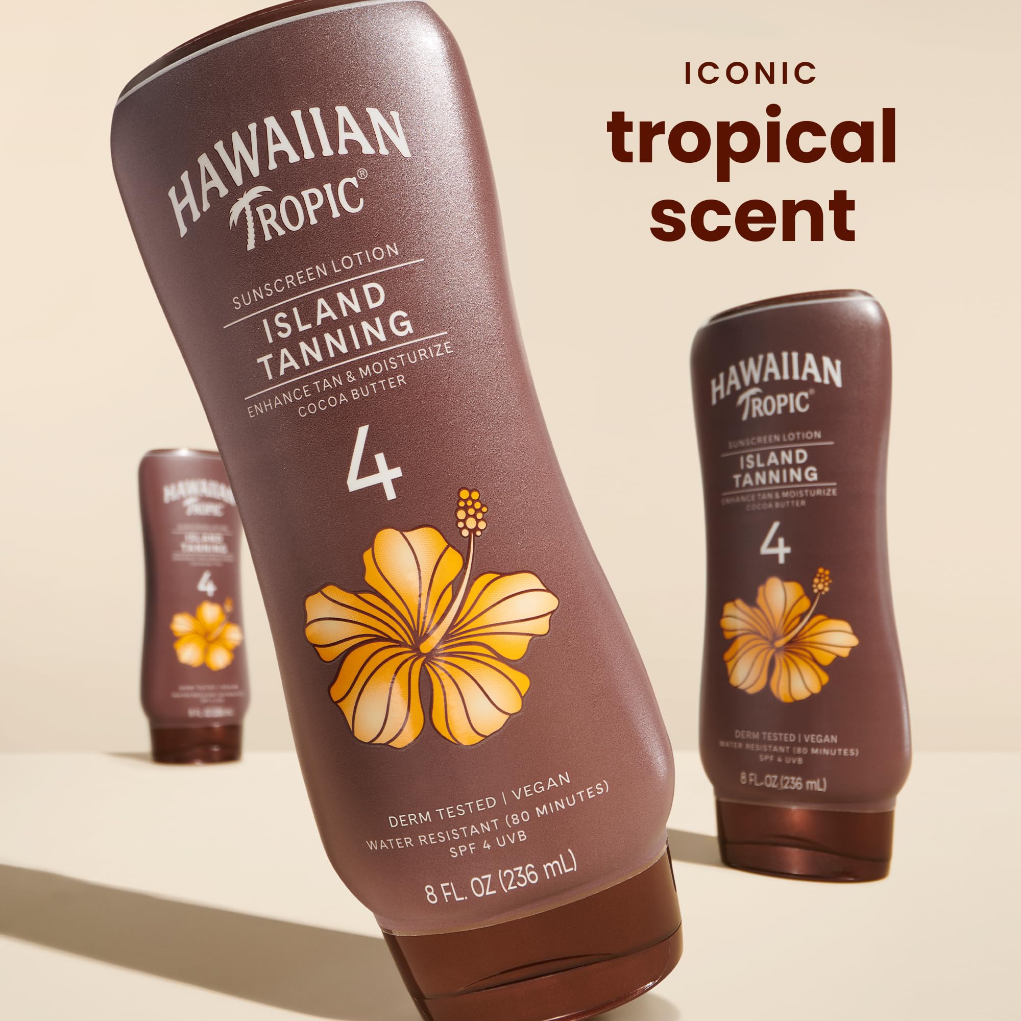Hawaiian Tropic Island Tanning Lotion SPF 4, self-tanner, 8 fl oz bottles, two-pack, with tropical packaging and smooth lotion texture.