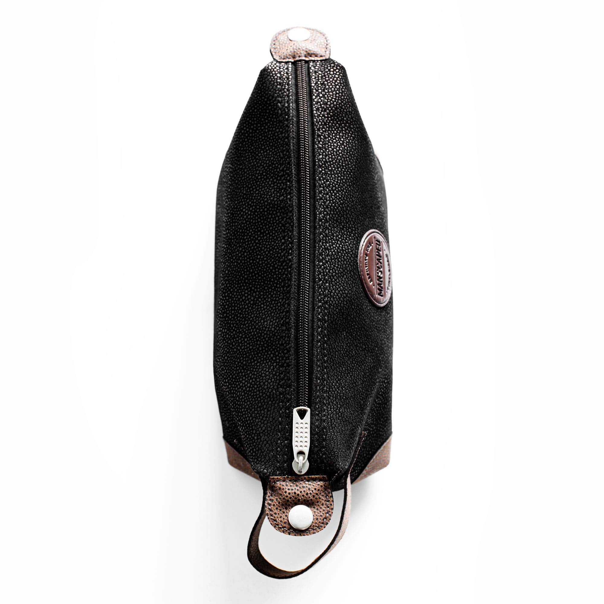MANSCAPED® The Shed men's toiletry bag in PU leather, a stylish Dopp kit with compartments for grooming essentials.