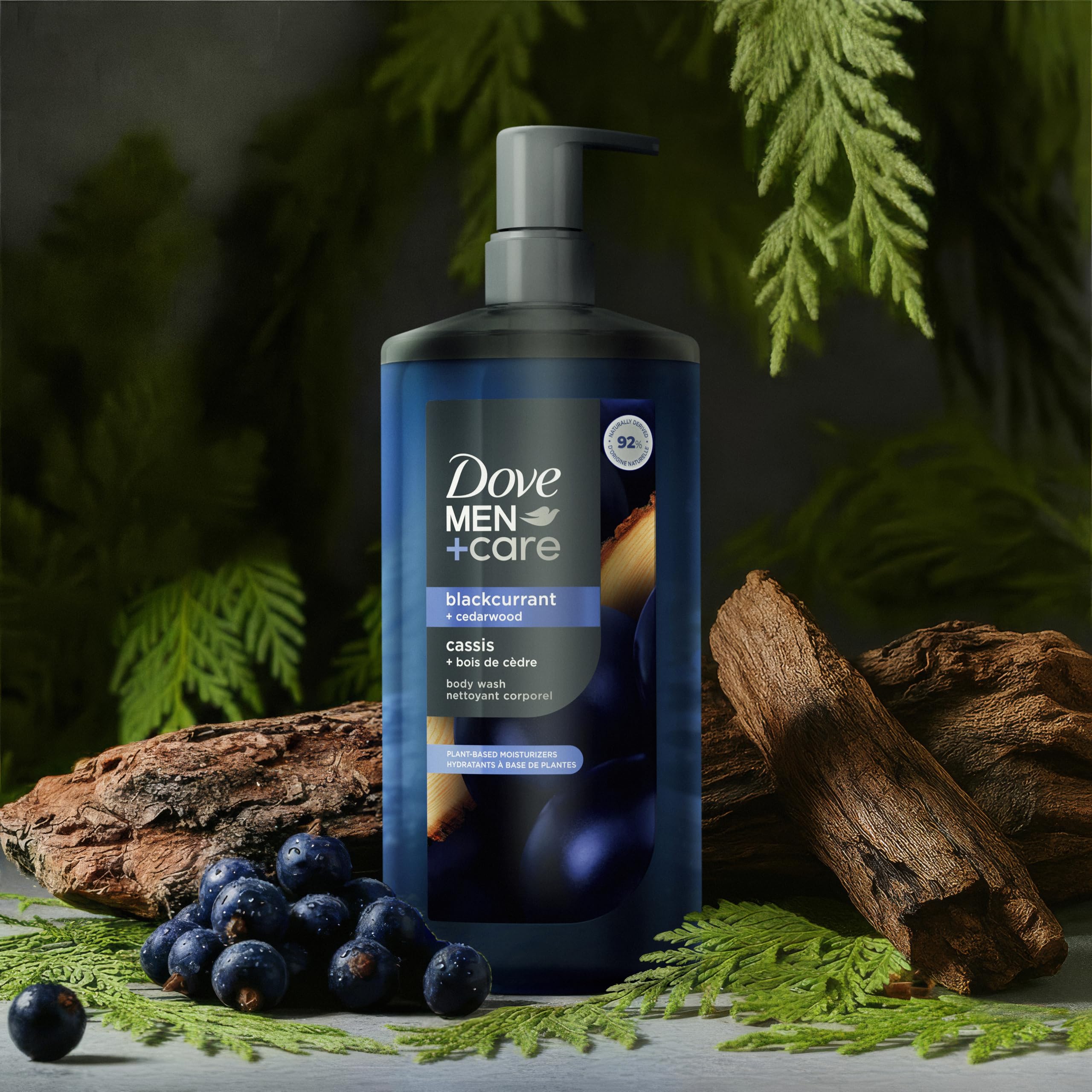 Dove Men+Care Blackcurrant & Cedarwood body wash bottle, 26oz, with blackcurrant and cedarwood scent for men's grooming.