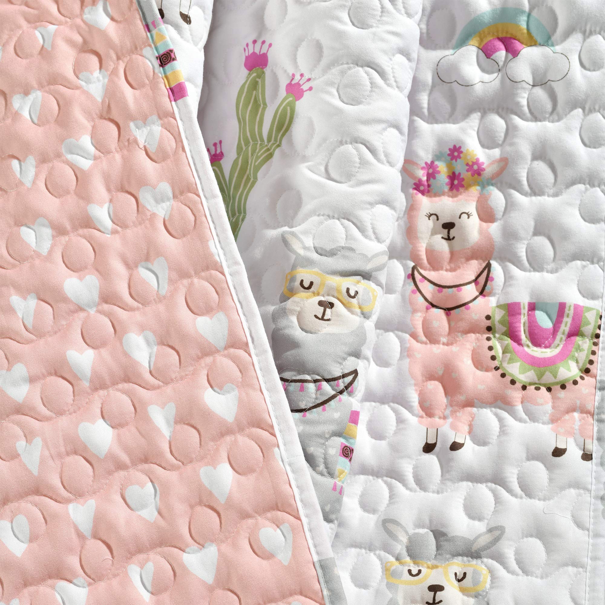 Lush Decor Southwest llama and cactus toddler throw blanket with white and blush boho quilted design, reversible and soft.