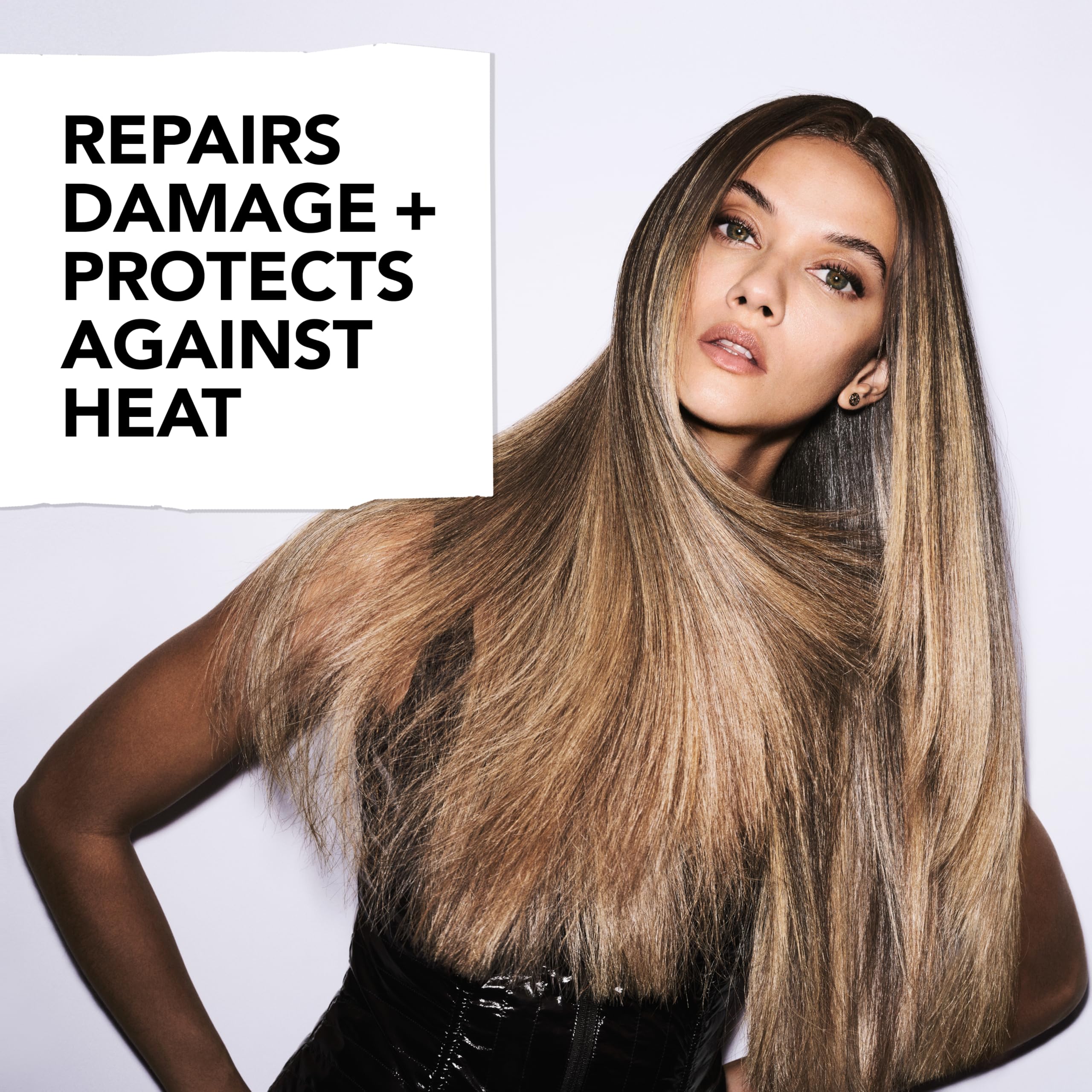 Bumble and bumble Heat Shield Thermal Mist in a 2 fl oz spray bottle, used as a hair styling agent for heat protection and styling.