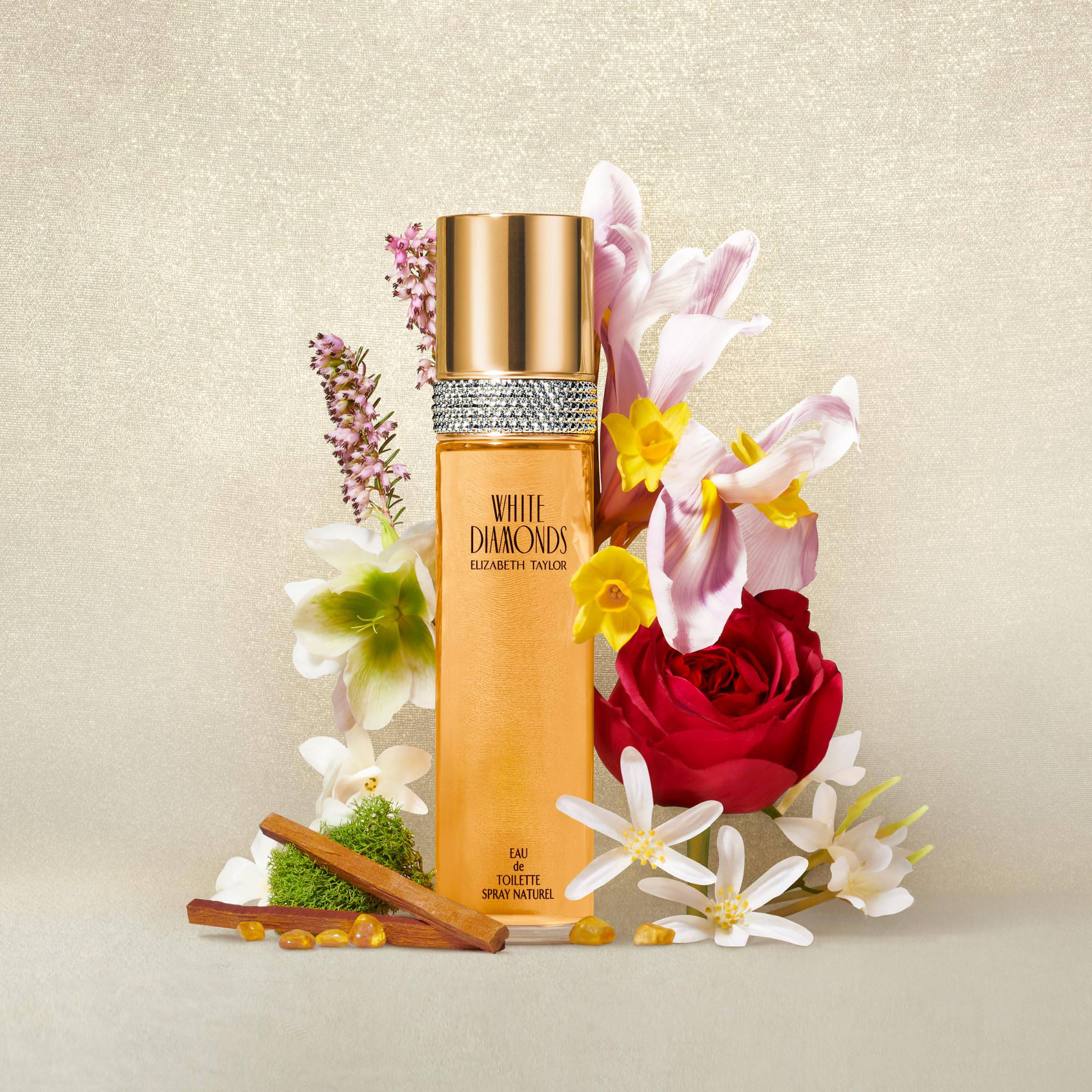 Elizabeth Taylor White Diamonds EDT perfume bottle for women, 3.3 fl oz, elegant white floral fragrance with gold accents.