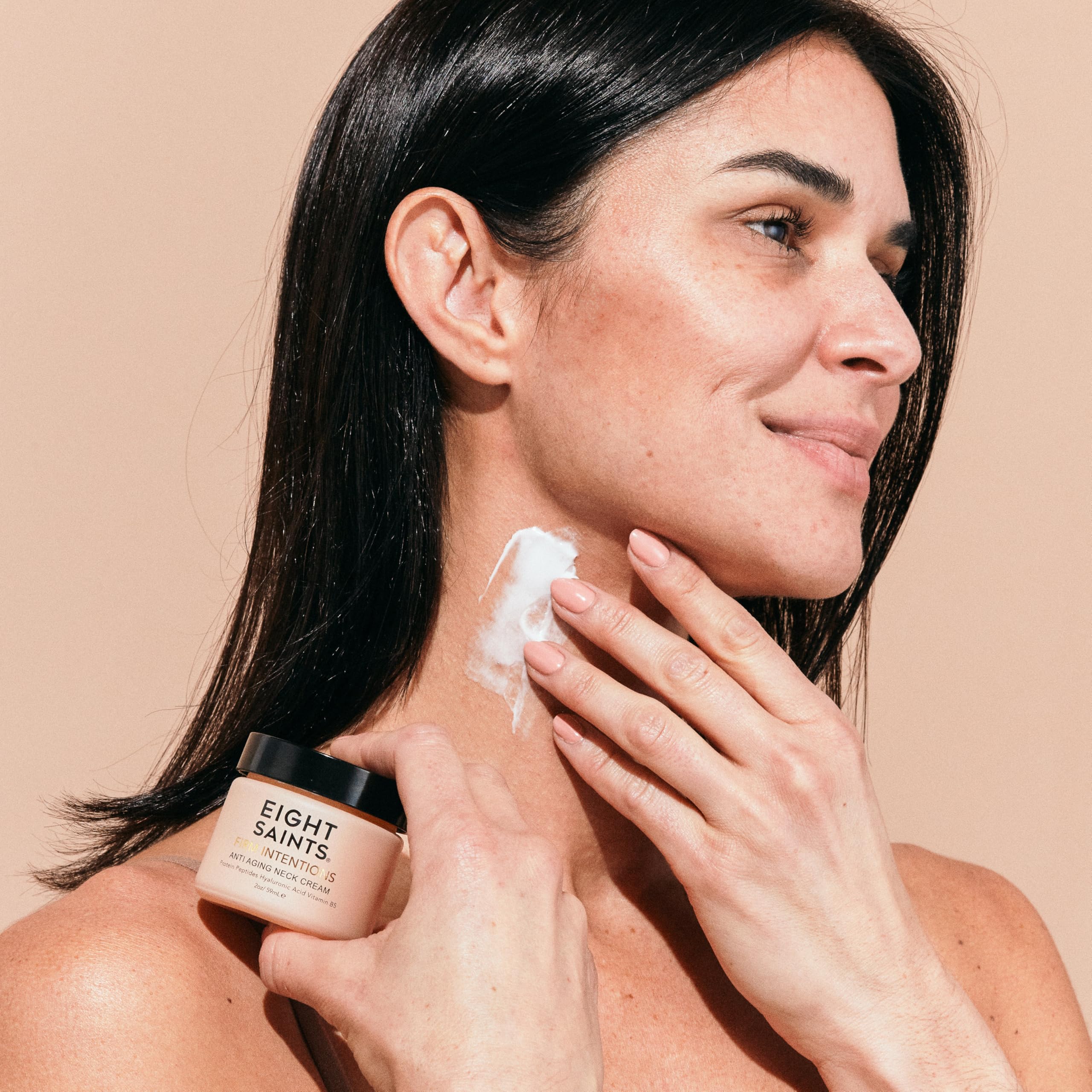 Eight Saints firming neck cream with peptides, hyaluronic acid, and niacinamide for anti-aging and wrinkle reduction.
