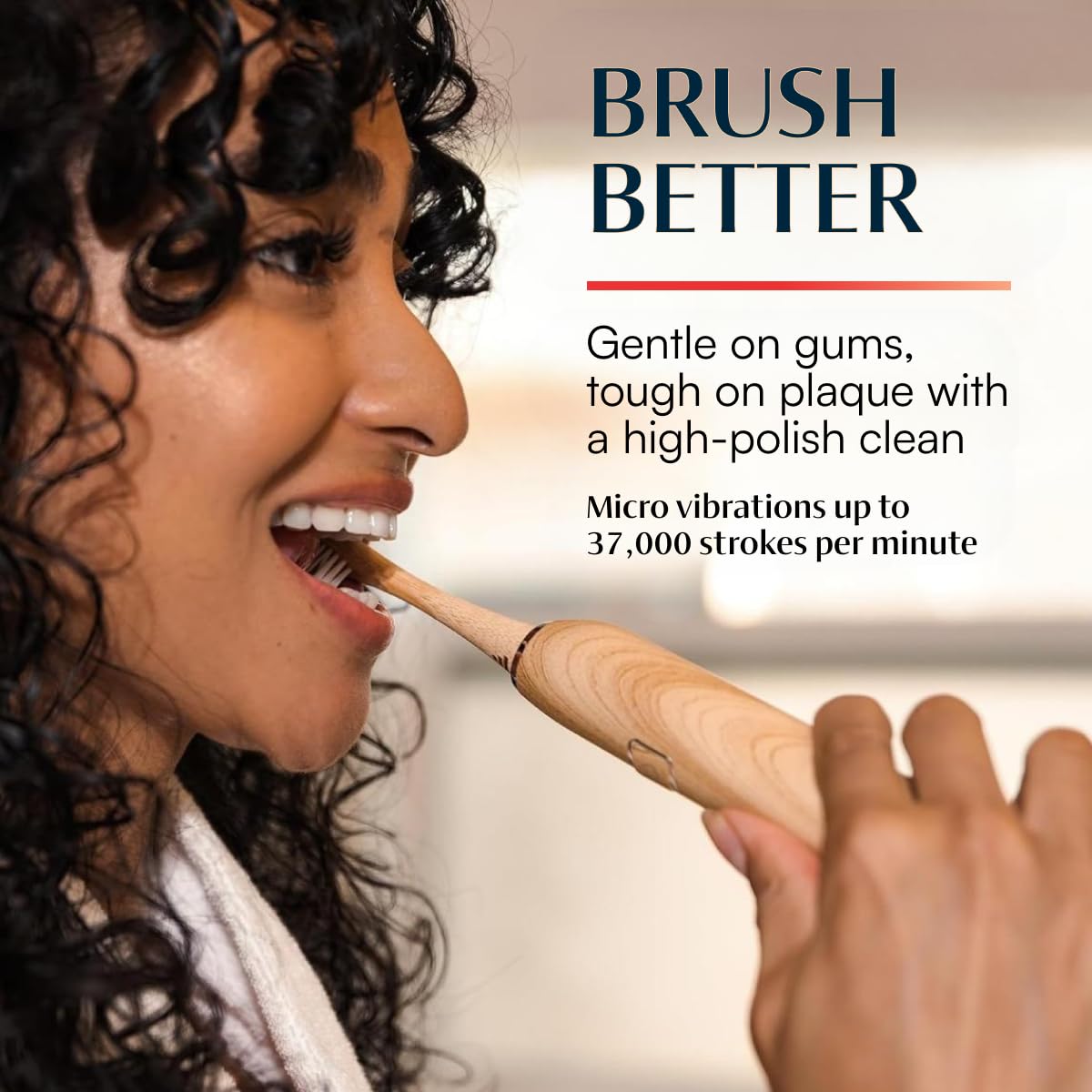 Better & Better bamboo sonic electric toothbrush with white handle and replaceable brush head for effective oral cleaning.