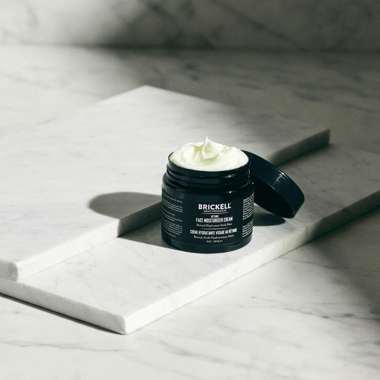 Brickell Men's Retinol Night Cream moisturizer with hyaluronic acid in a 2oz jar, designed for men's skin hydration and rejuvenation.