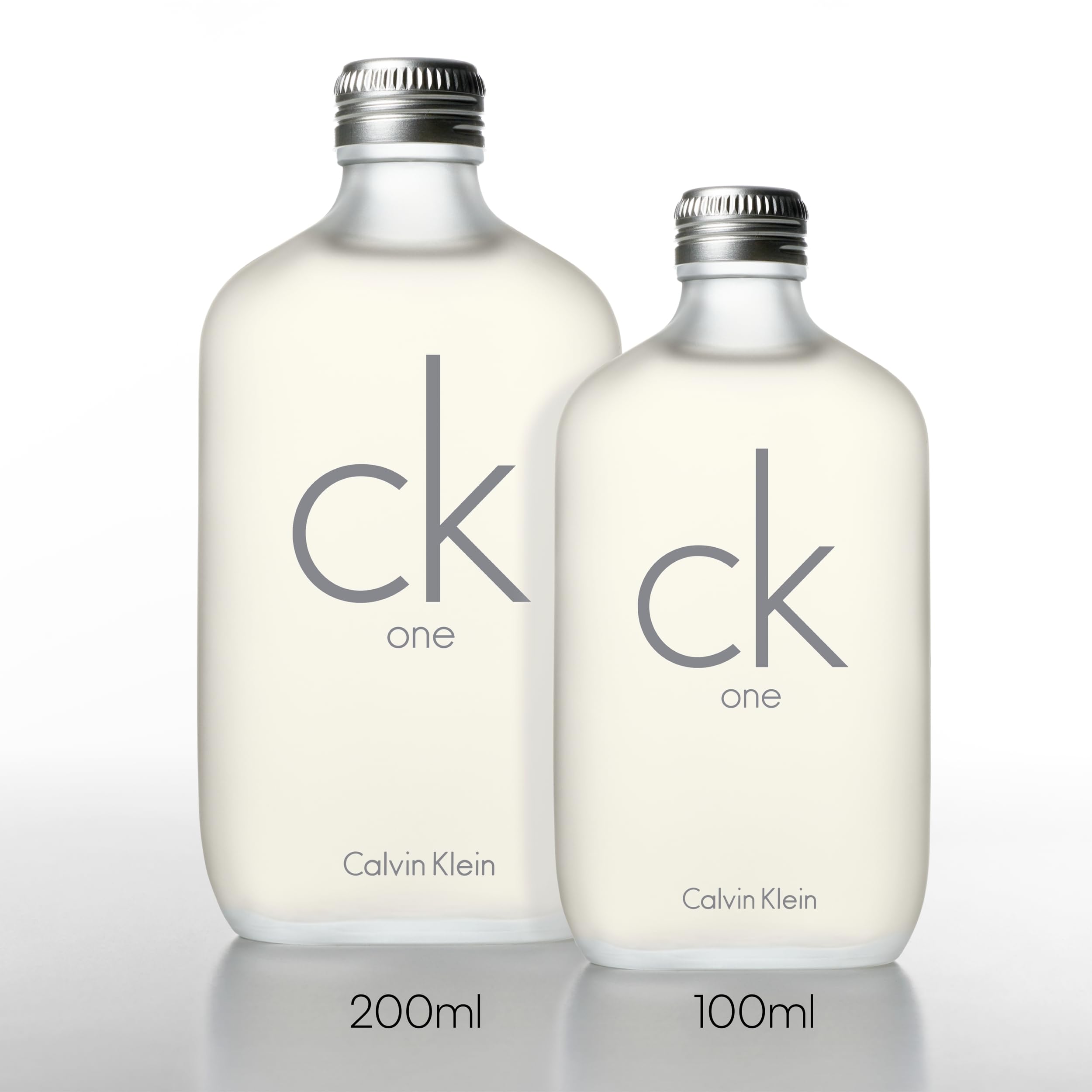 Calvin Klein CK One unisex Eau de Toilette 1.7 oz bottle, clear glass with minimalist label, iconic fragrance for both men and women.