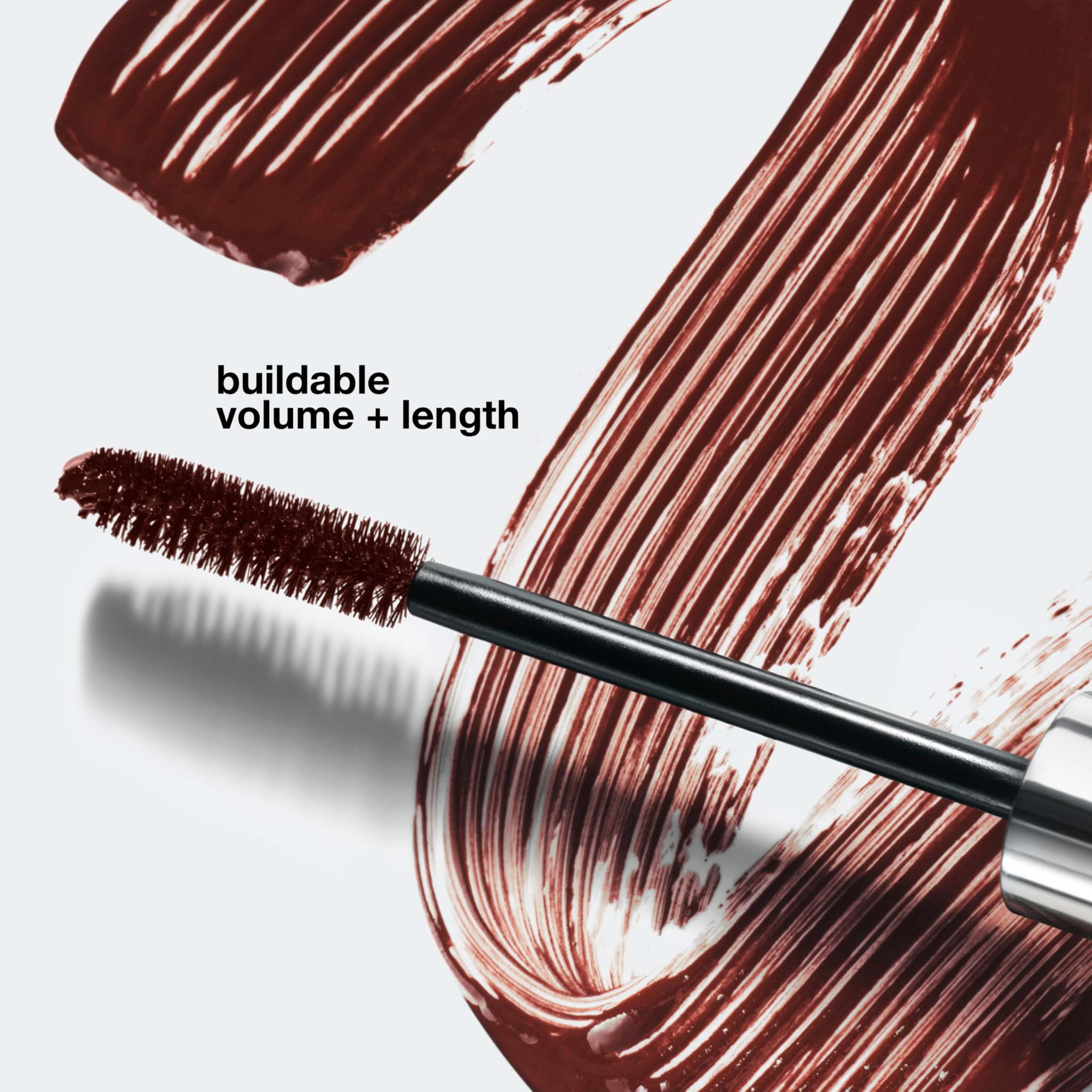 Clinique High Impact Mascara in Black Honey applied to eyelashes, designed for sensitive eyes, enhancing volume and length.
