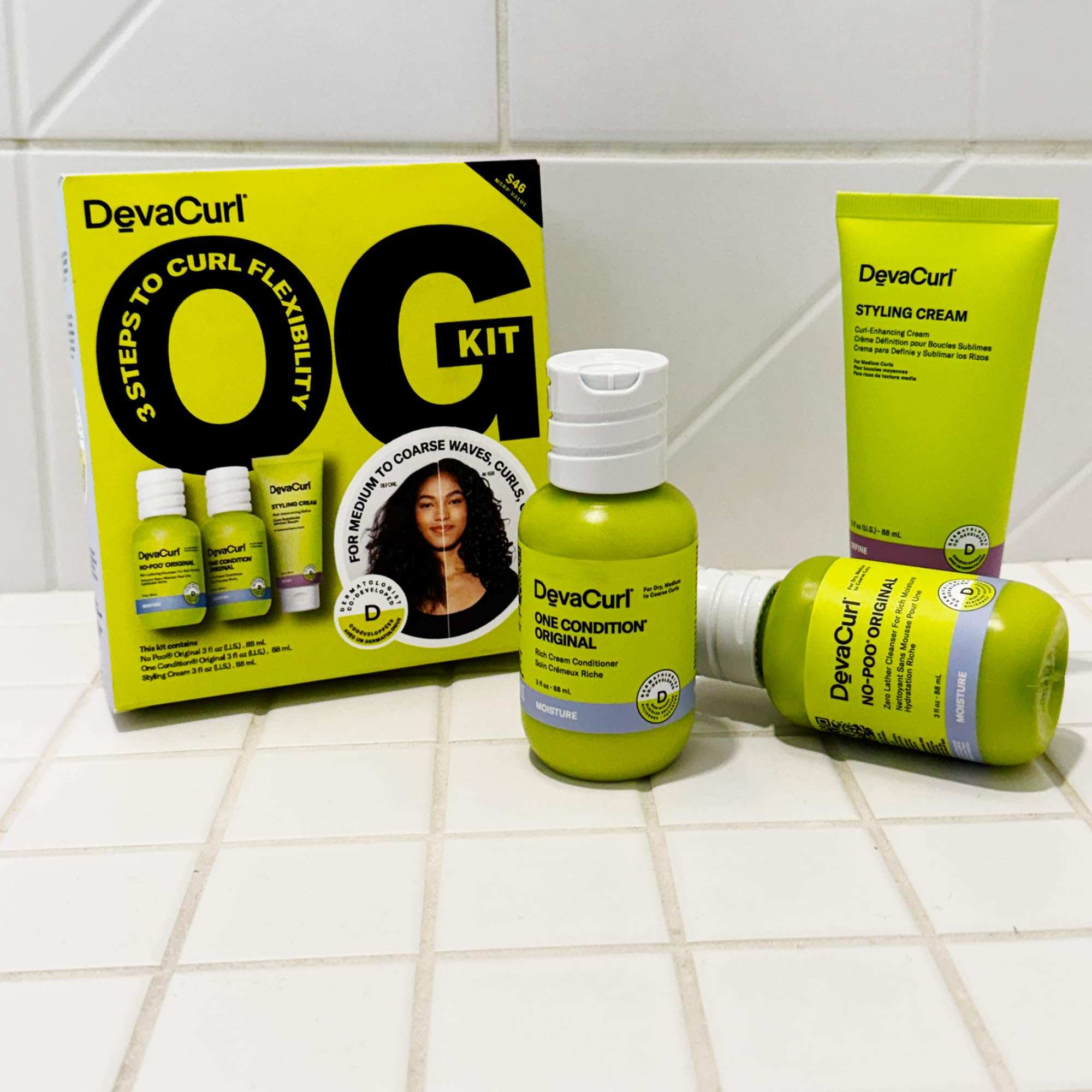 DevaCurl OG Kit travel set with curl cleaner and conditioner for defining and moisturizing curly hair.