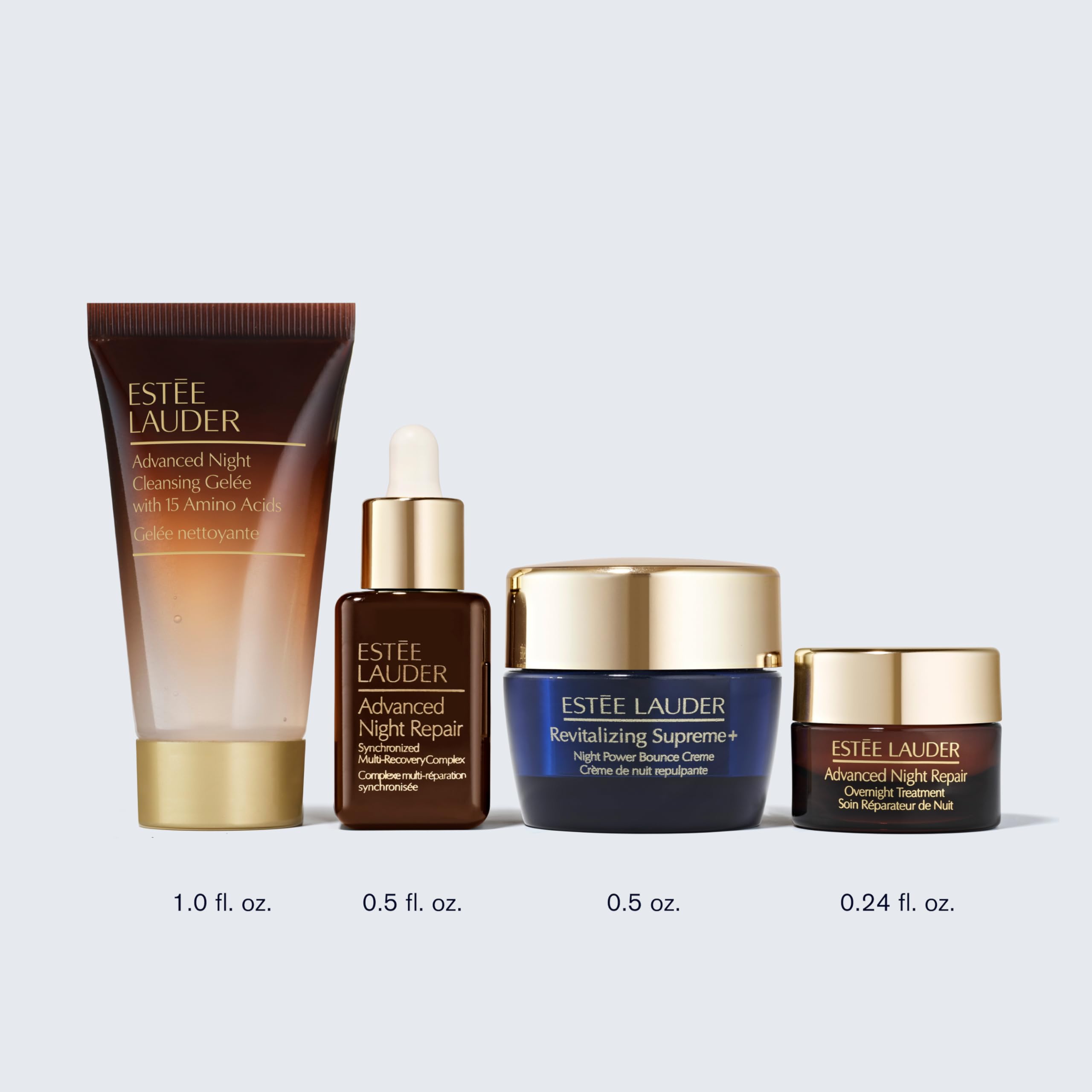 Estée Lauder Dream Skin 4-piece night skincare set with moisturizers and serums, arranged on a white background.