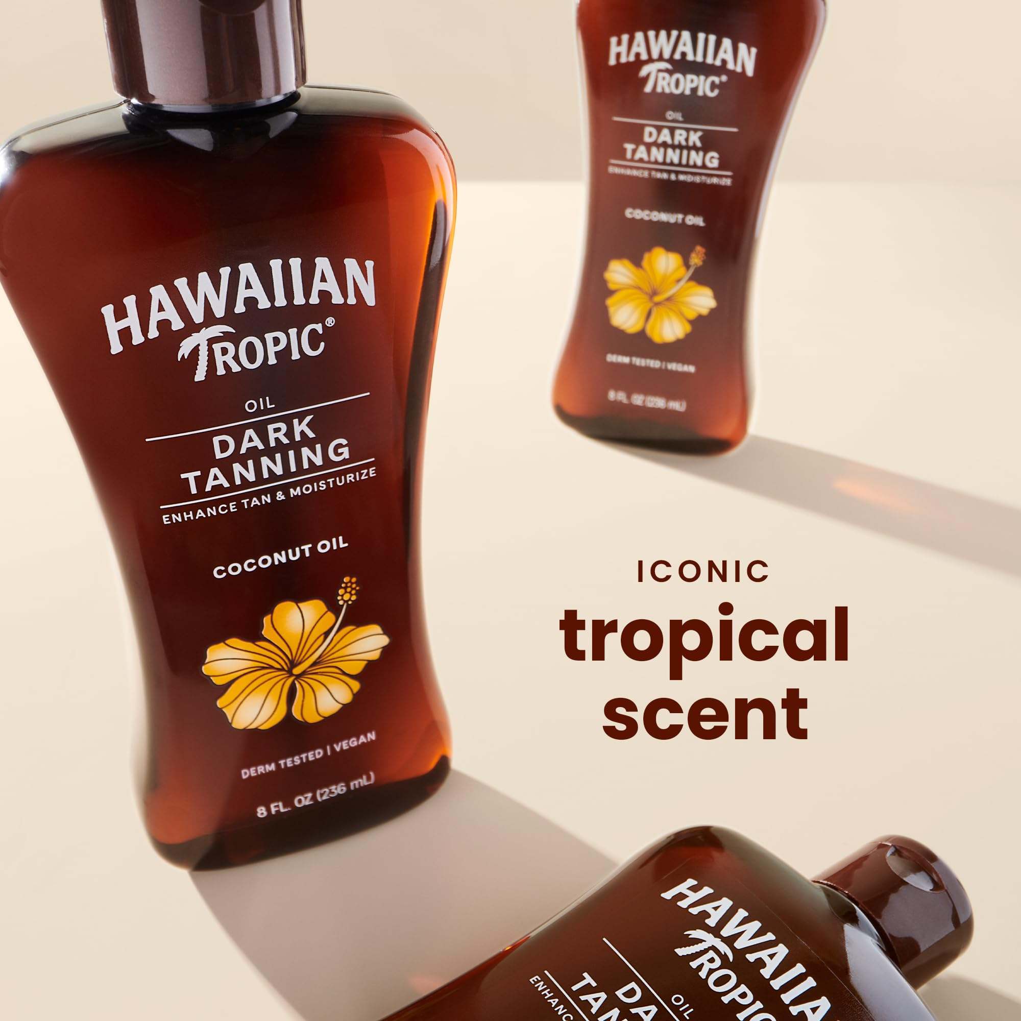 Hawaiian Tropic Dark Tanning Oil twin pack in 8 fl oz bottles, moisturizing skin with tropical-inspired formula, natural sun protection.