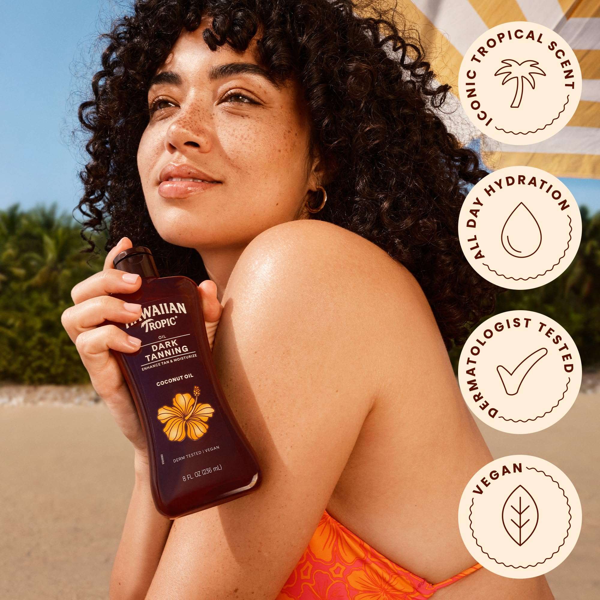 Hawaiian Tropic Dark Tanning Oil twin pack, 8 fl oz each, for skin moisturizer and sun tanning, in a natural outdoor setting.