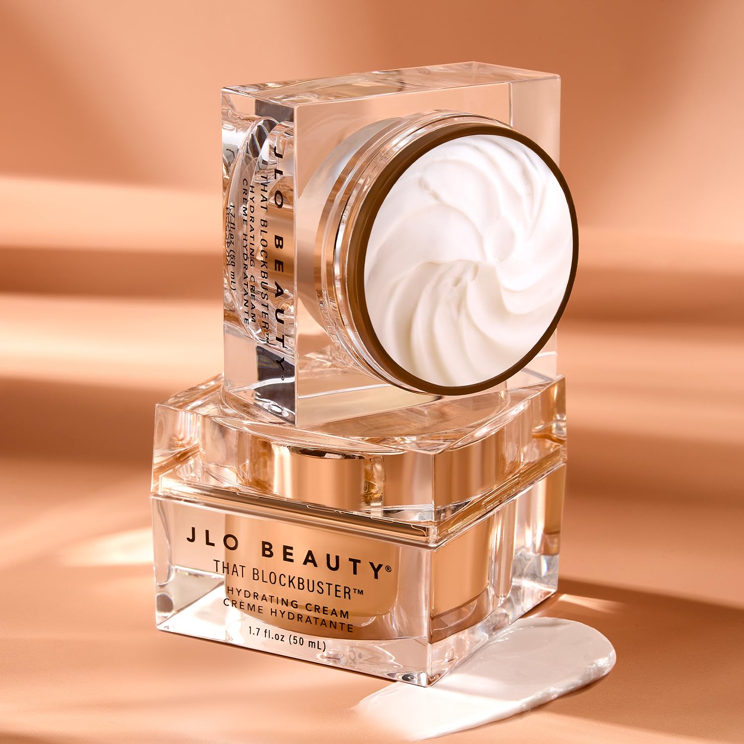 JLO BEAUTY That Blockbuster Hyaluronic Acid Face Moisturizer 1.7oz bottle with a sleek design and pump dispenser.