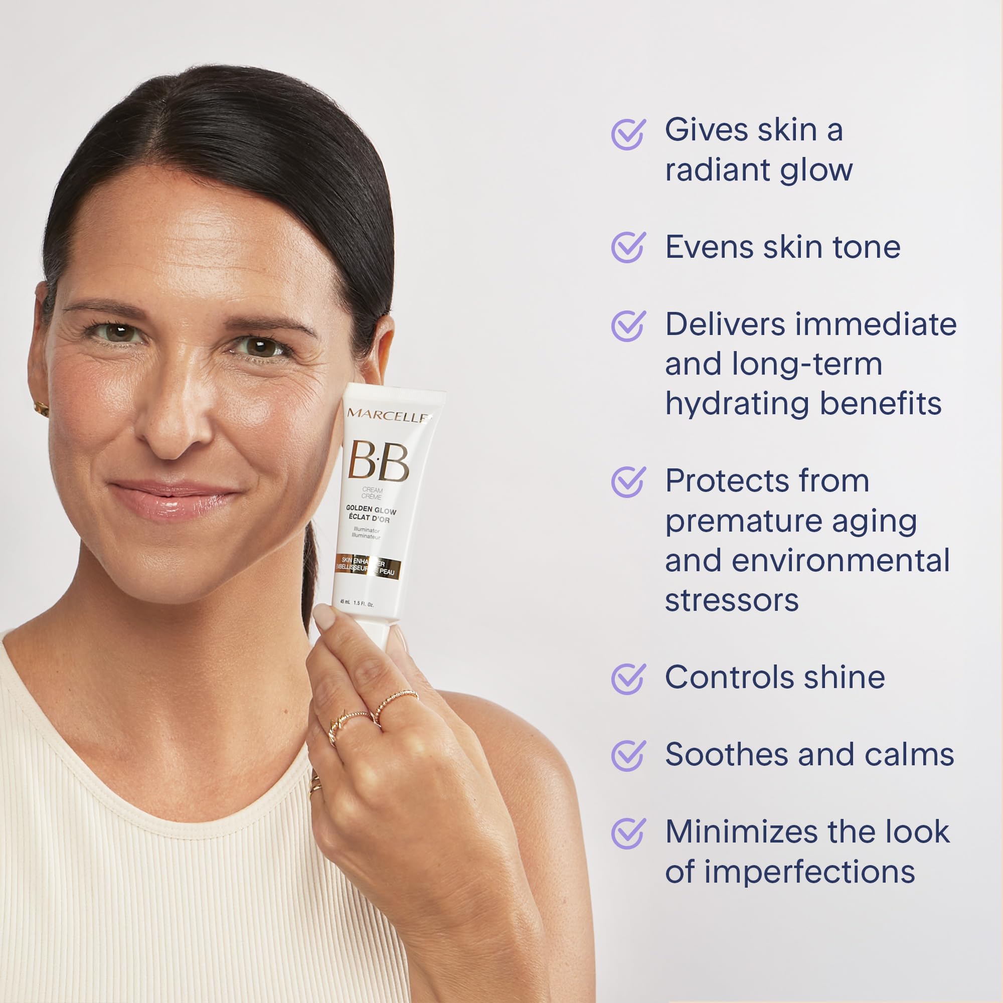 Marcelle BB Cream Golden Glow 8-in-1 tinted balm, skin foundation and concealer with a luminous finish, in a compact tube.