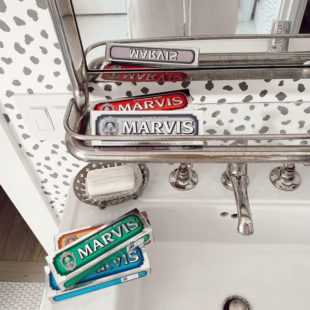 Marvis Whitening Mint Toothpaste 3.8 oz in a tube, featuring a white and blue packaging with mint flavor branding.