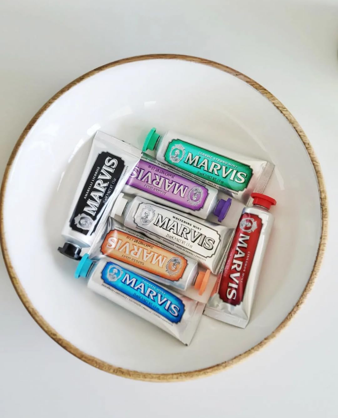 Marvis Whitening Mint Toothpaste 3.8 oz tube, a stylish toothpaste for fresh breath and brightening teeth.