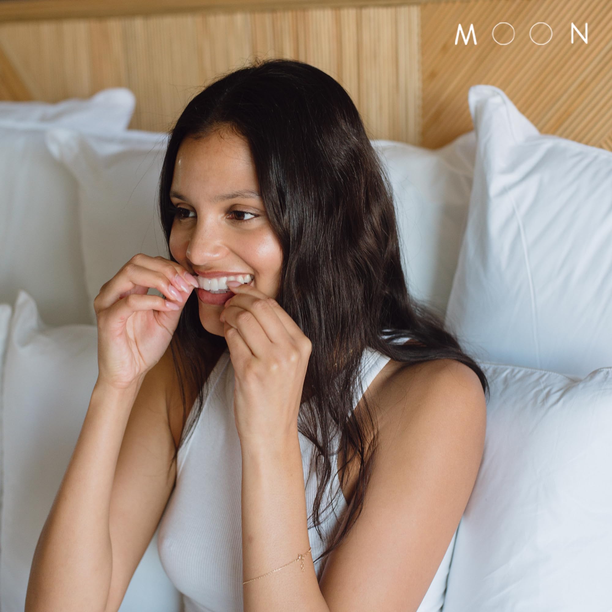 MOON dissolving whitening strips for teeth, peppermint flavor, 56 count, designed to brighten teeth in 7 shades.