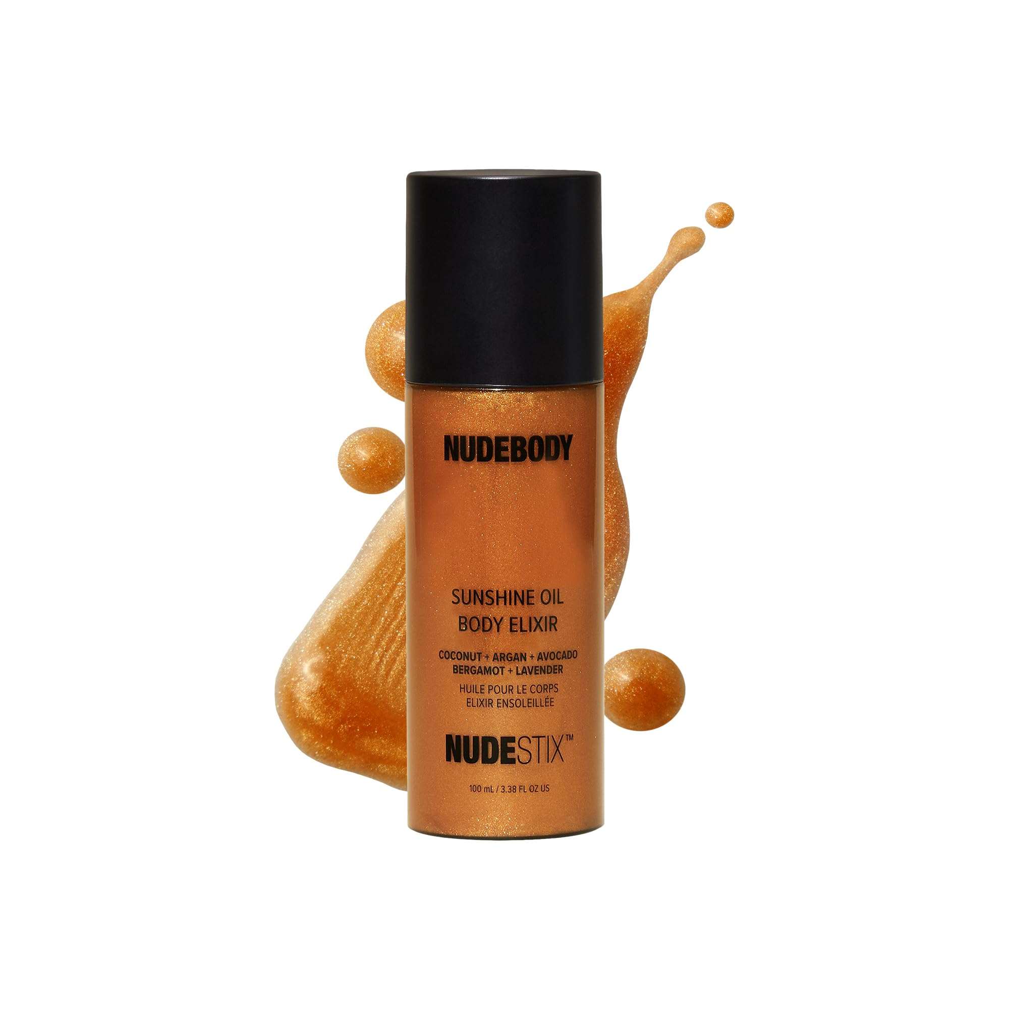 Nudestix Sunshine Oil Body Elixir gradual tan shimmer moisturizer with a golden glow and luminous finish on smooth skin.
