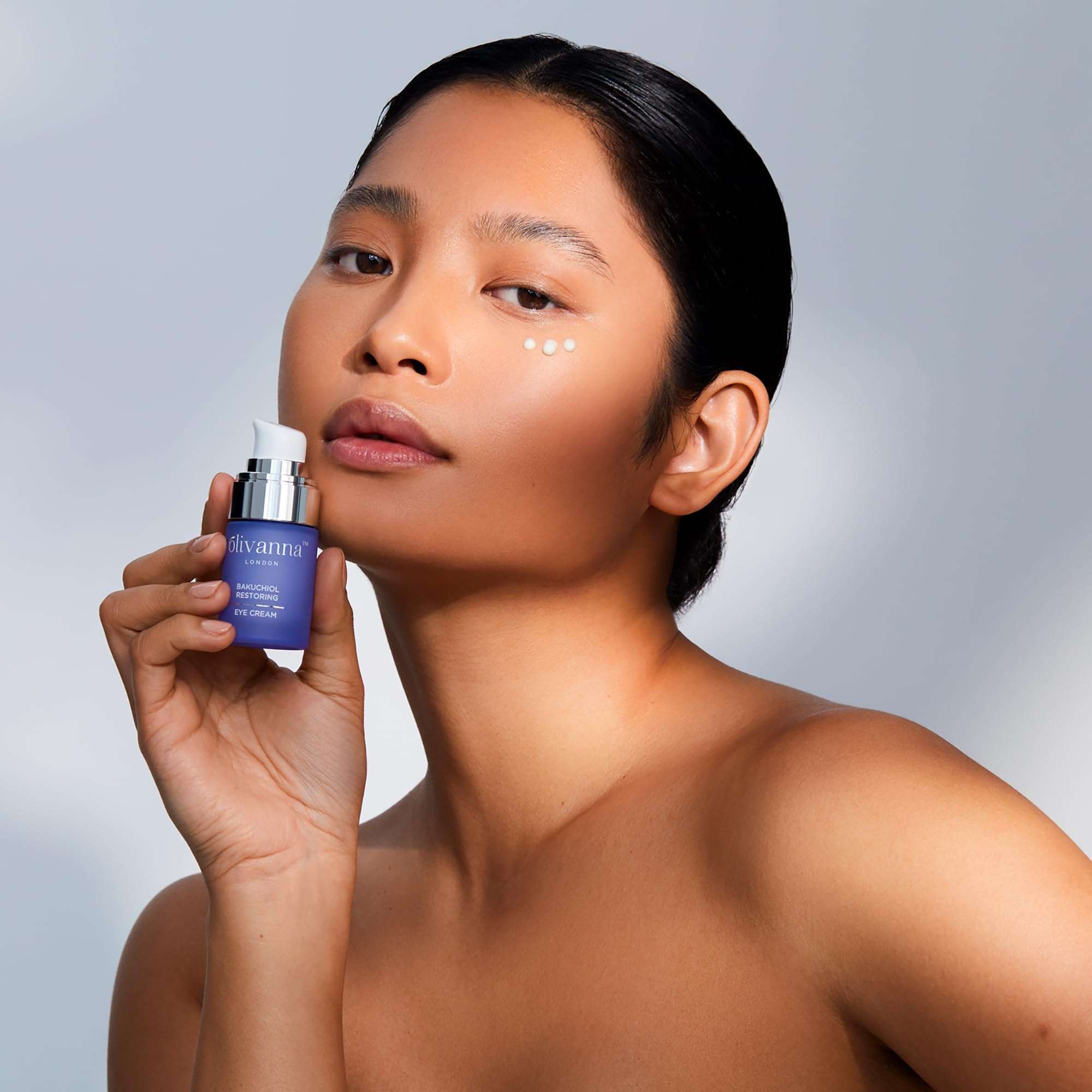 Olivanna Bakuchiol Eye Cream for dark circles, 0.5oz, in a sleek jar showing the skincare product for reducing under-eye puffiness.