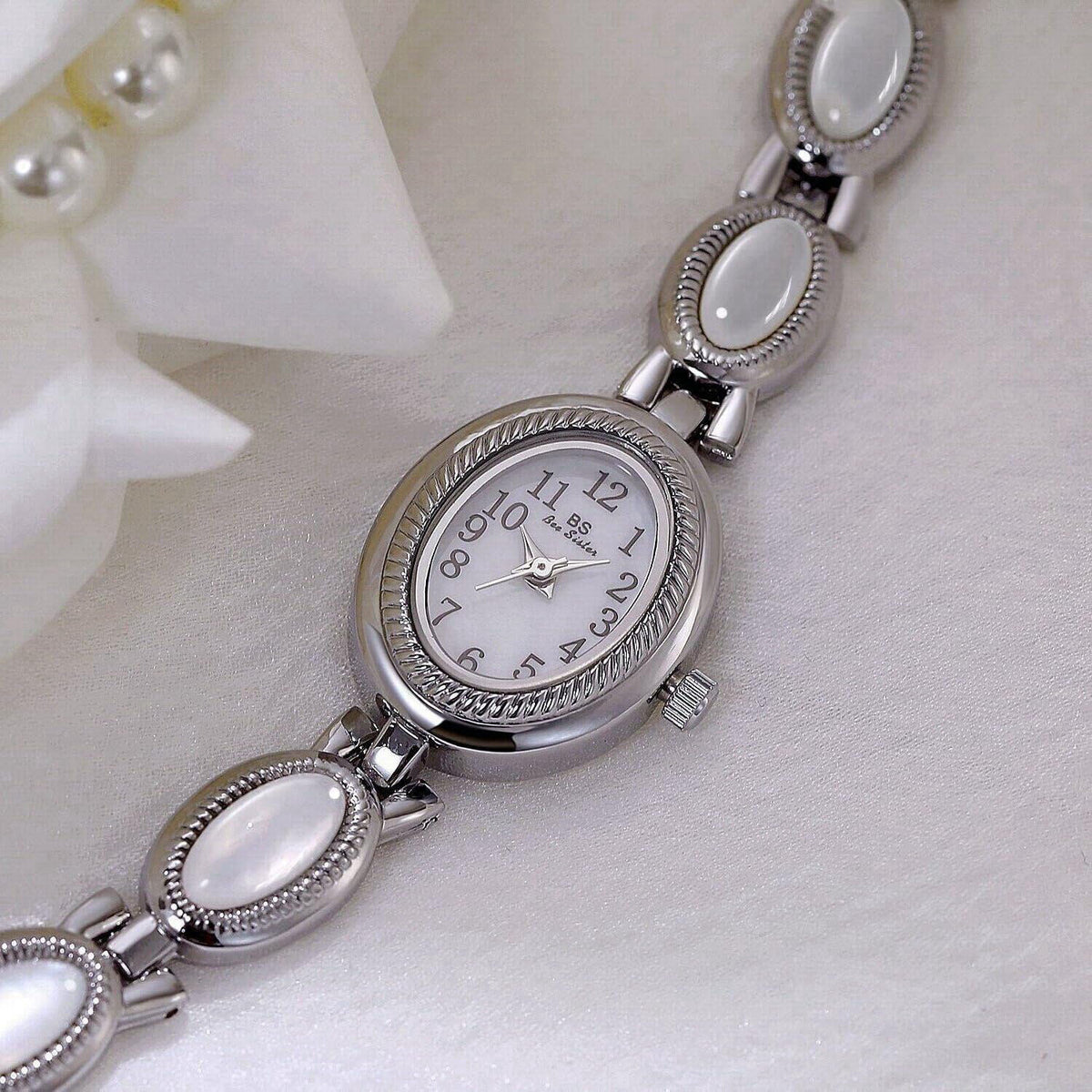 CARLIEN Women's Classic Dainty Pearl Shell Arabic Numerals Oval Quartz Watch – full view