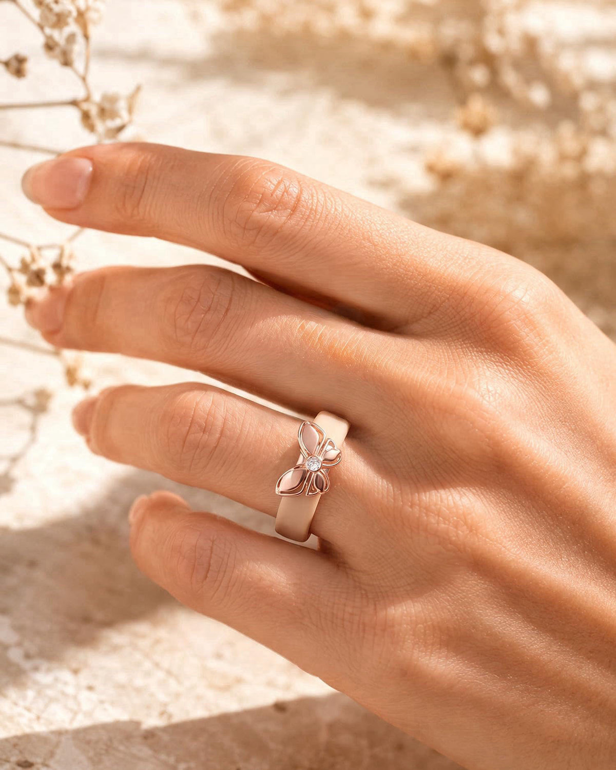 Egnaro Women Silicone Ring with Copper Alloy Butterfly Flexible Rubber Band – close-up detail in PACK A: Nude / Metal Bu