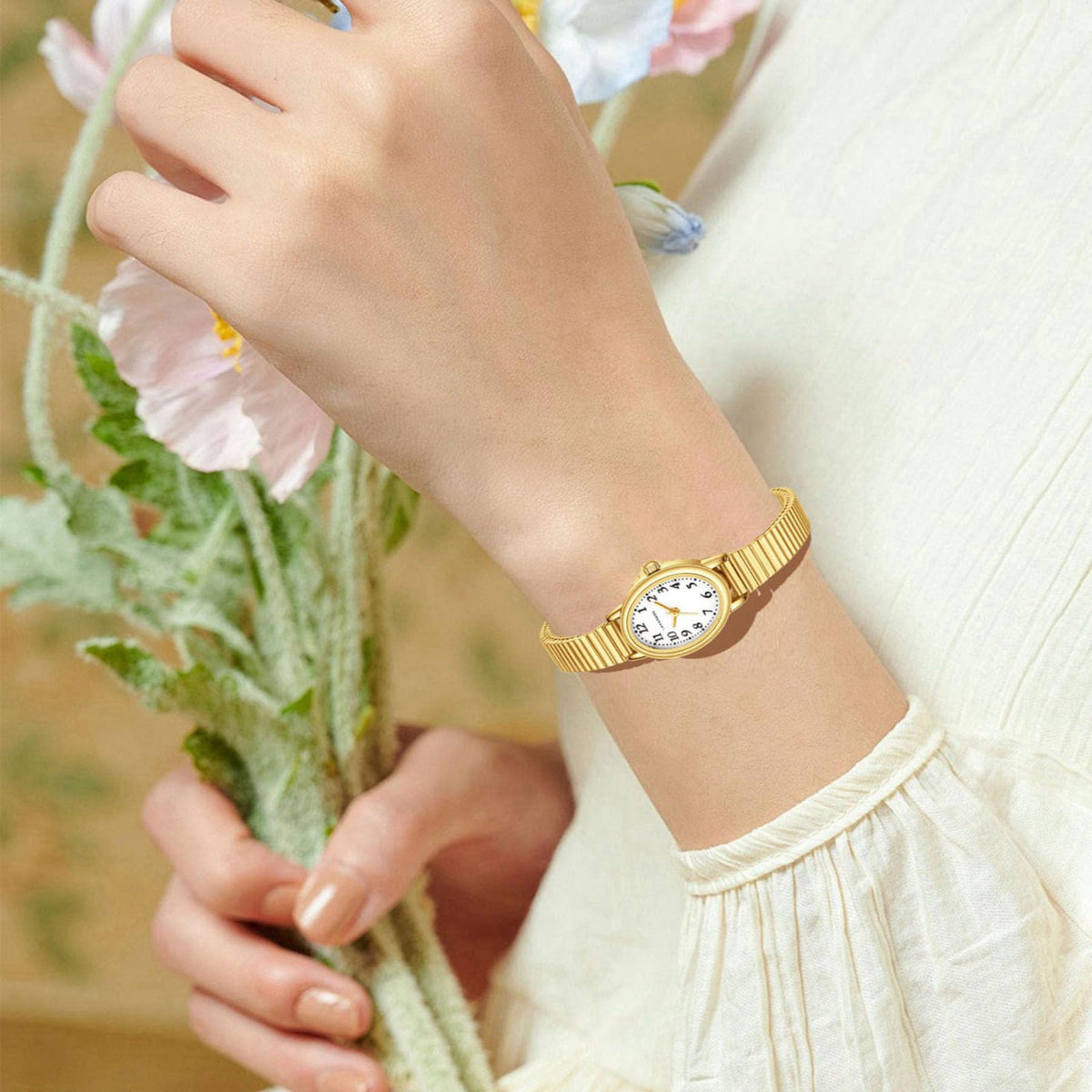VTAIGE Small Gold Watch for Women, Oval Case, Analog, Steel Expansion Band – close-up detail