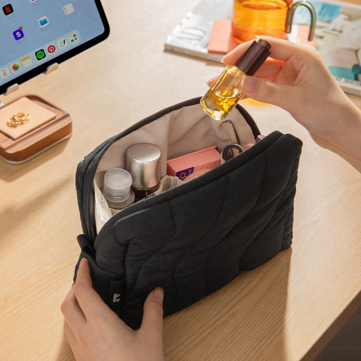 tomtoc – Cable Organizer Bags &amp; Cases on display