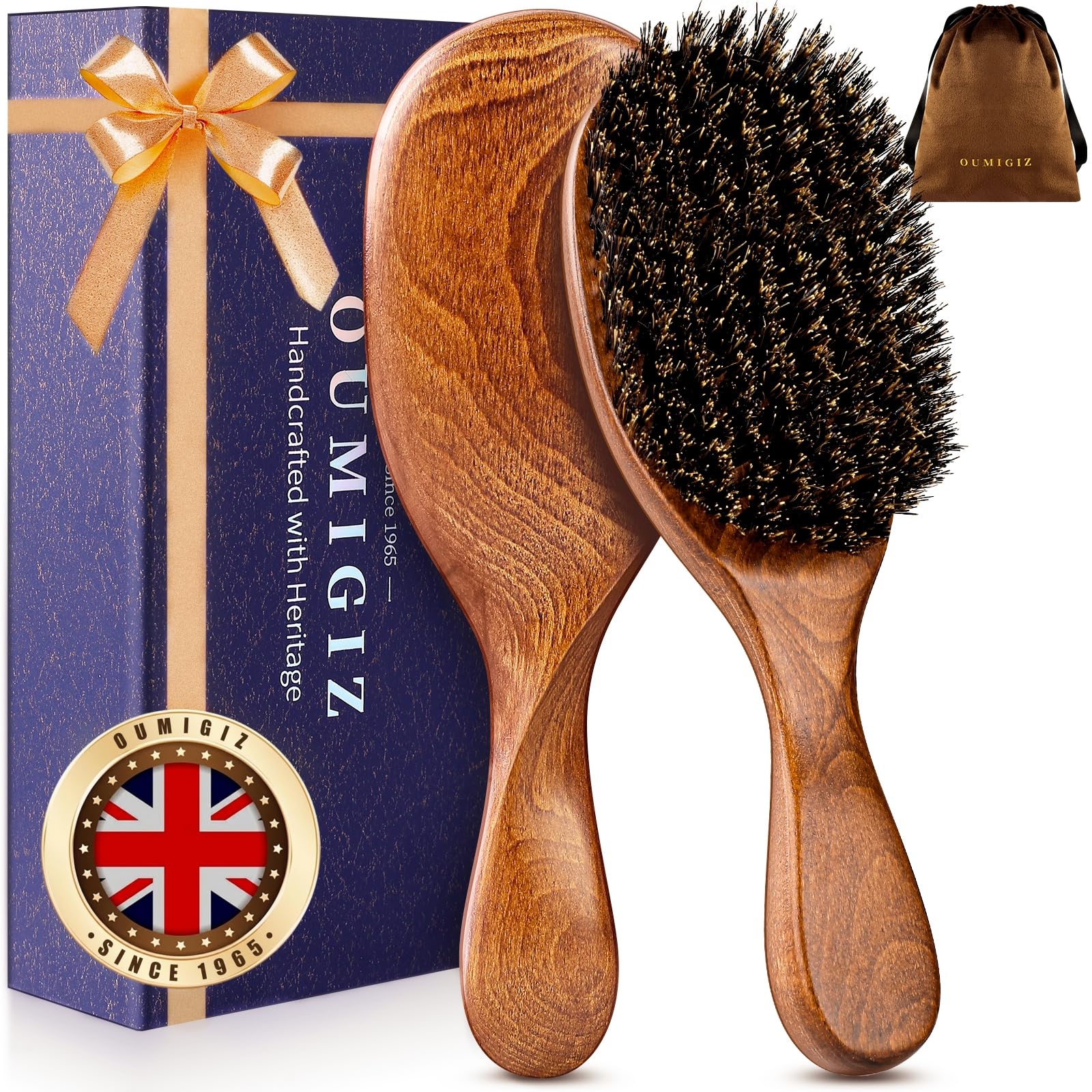 OUMIGIZ 100% boar bristle hair brush showcasing natural bristles and classic wooden handle, reflecting British craftsmanship since 1965.
